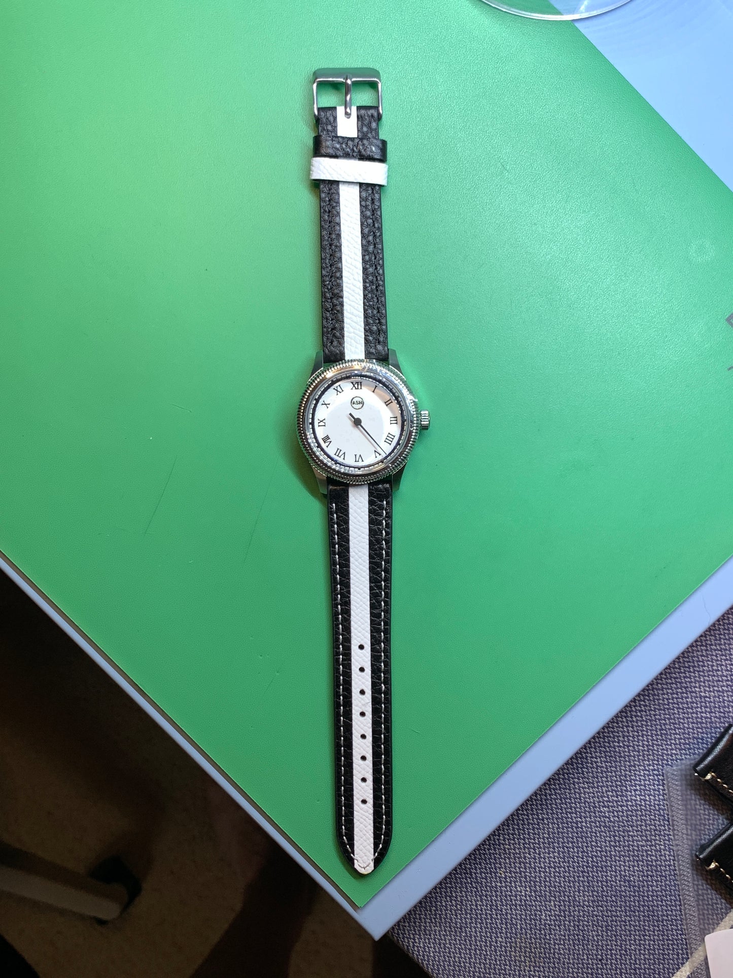 Thereabouts - One hand watch. 38mm coin edged stainless steel case. Enamel dial. Boxed K-1 crystal. Exhibition case back with blue custom rotor. Seiko NH38.