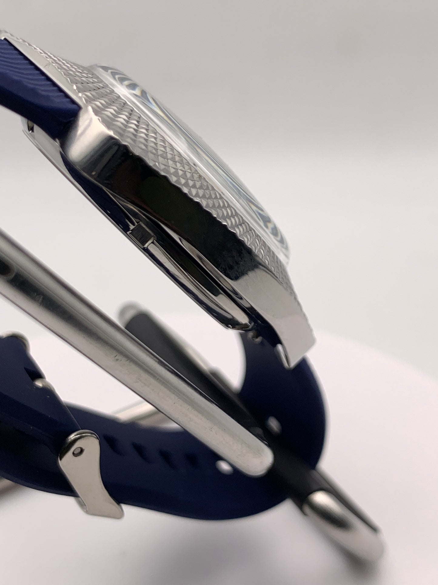 Lily 1.1 - Faceted 37mm stainless steel case. Acrylic domed crystal. Charlotte stone dial.  Seiko NH38.