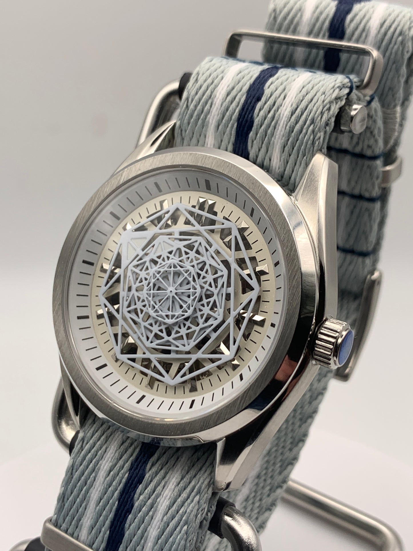 Blizzard - 40mm Stainless steel case. Sapphire crystal.  Snowflake dial and handset. Seiko NH70 skeleton automatic.