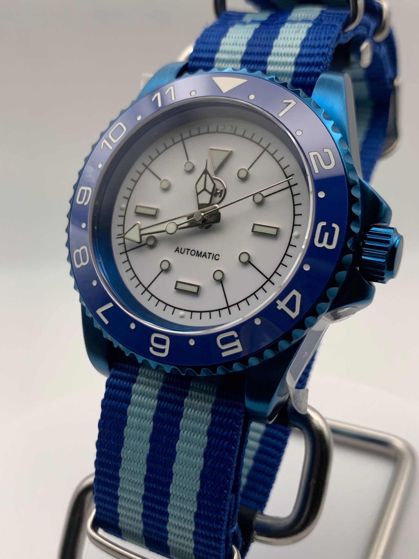 Europa - 41mm Blue anodized stainless steel case. Sapphire crystal. Seiko NH38.