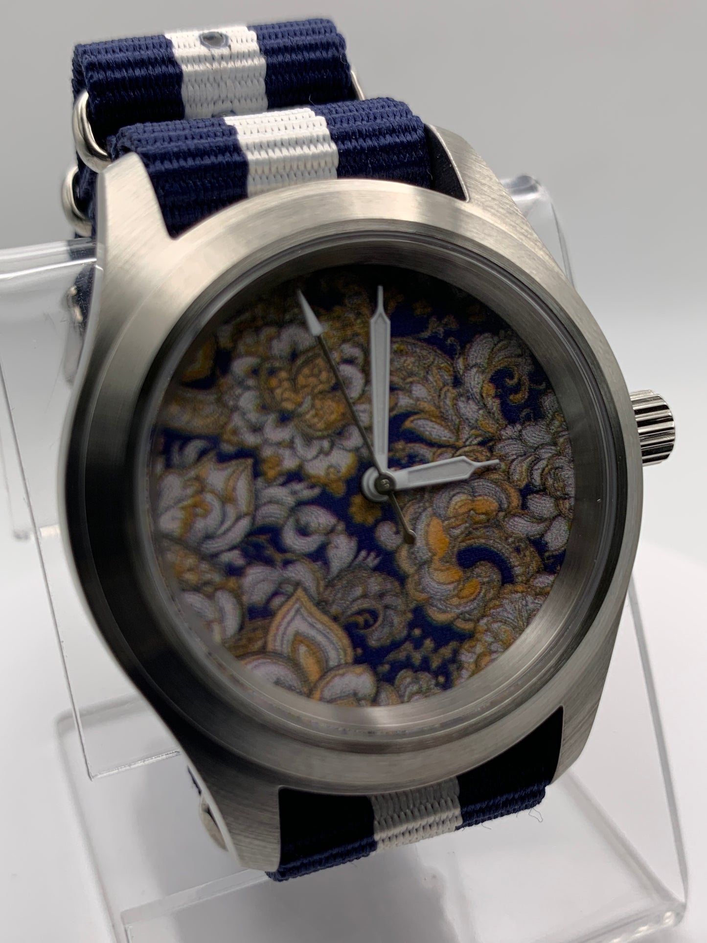Cloth & Steel. 38mm brushed stainless steel. Ornate dial. Sapphire crystal. Seiko NH38