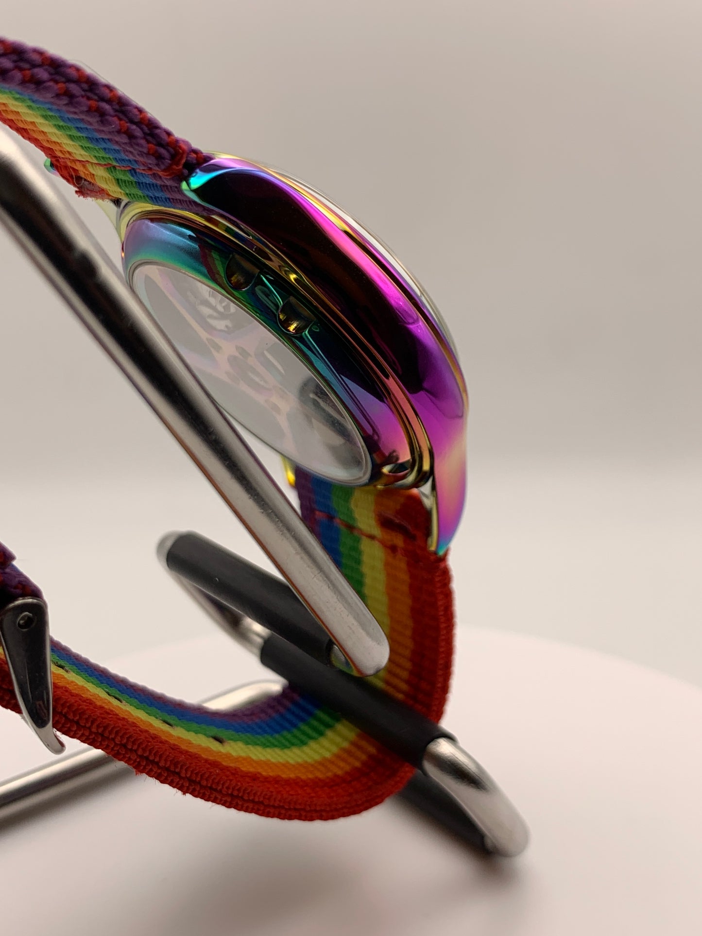 Portable rainbow. 38mm thermally colored stainless steel case and case back. Double dome K-1 mineral crystal. Seiko NH35.