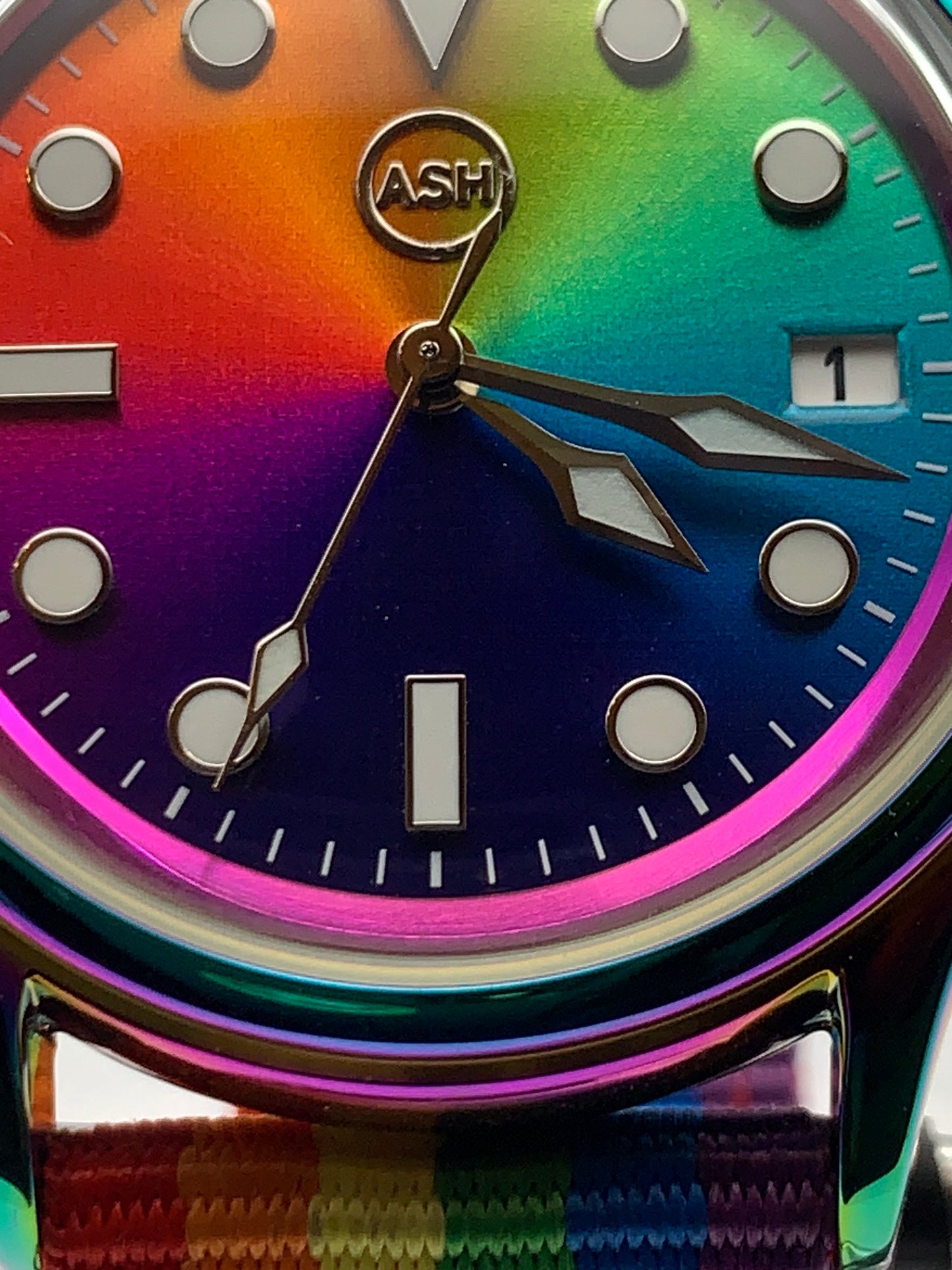 Portable rainbow. 38mm thermally colored stainless steel case and case back. Double dome K-1 mineral crystal. Seiko NH35.