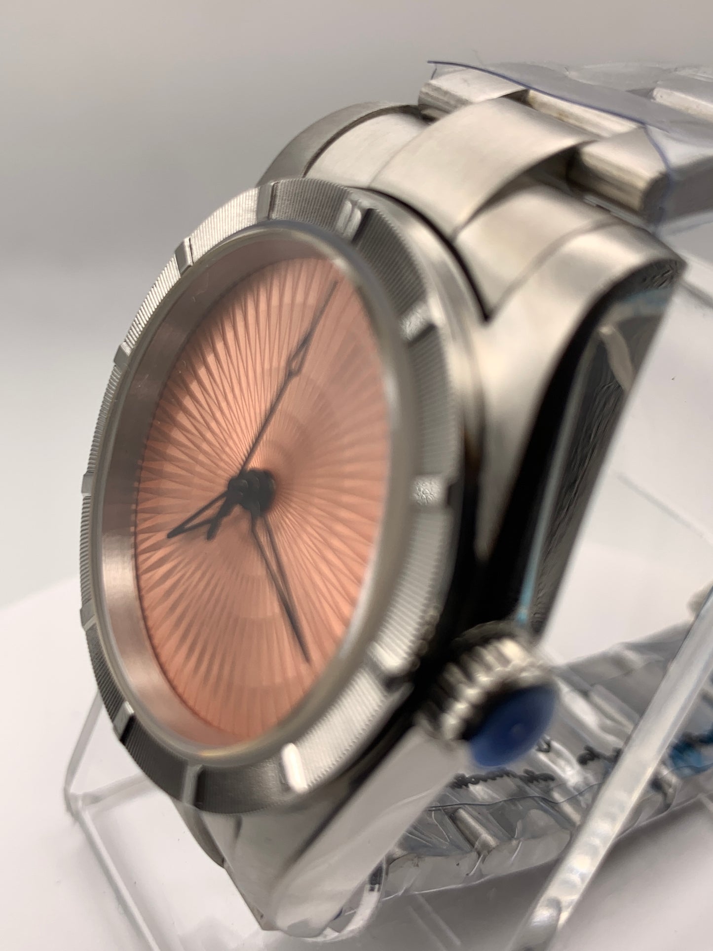 Sunbeam. 39mm stainless steel case and matching bracelet. Textured dial and unique handset. Sapphire crystal. NH38 automatic movement.
