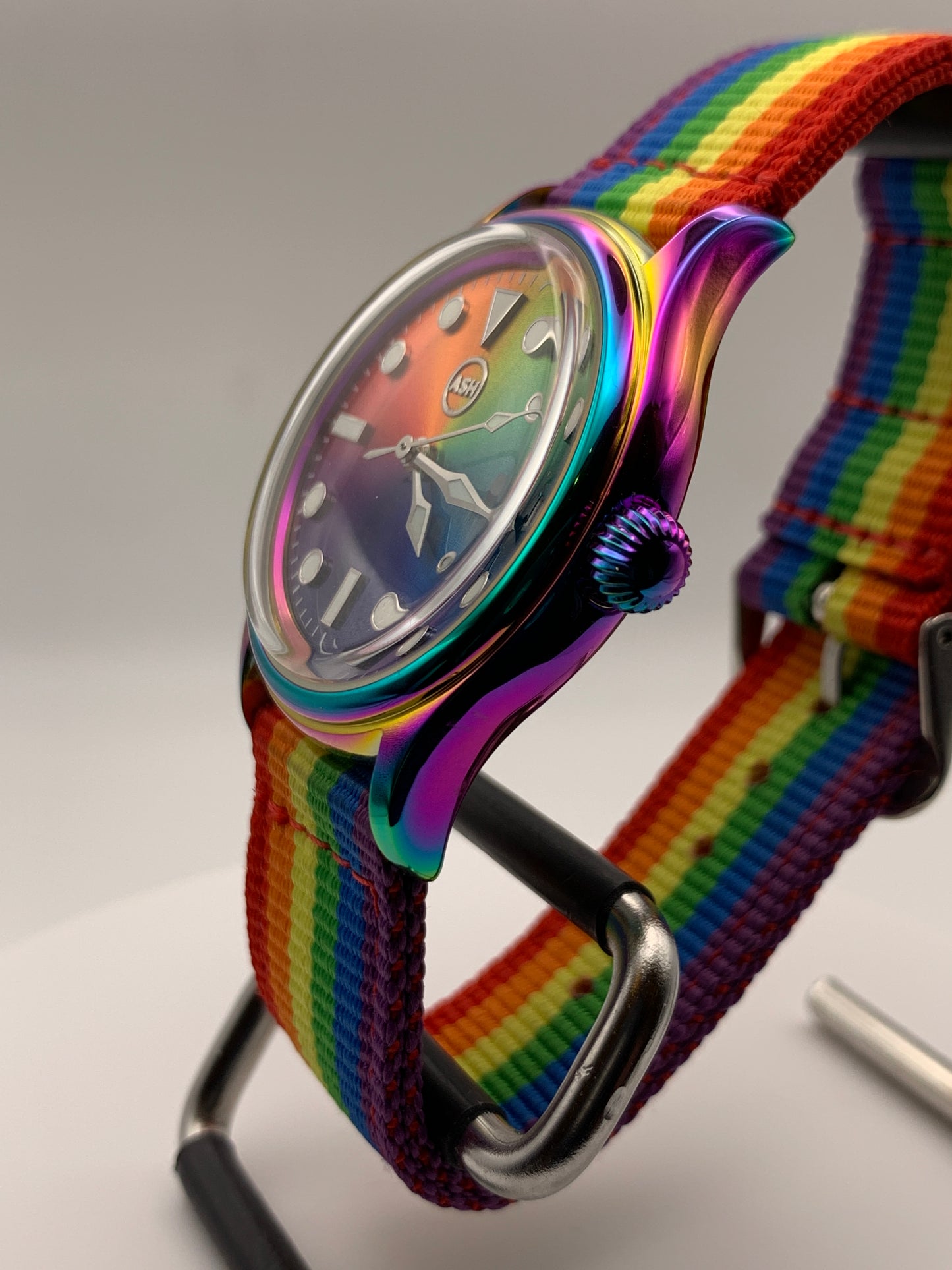 Portable rainbow. 38mm thermally colored stainless steel case and case back. Double dome K-1 mineral crystal. Seiko NH35.