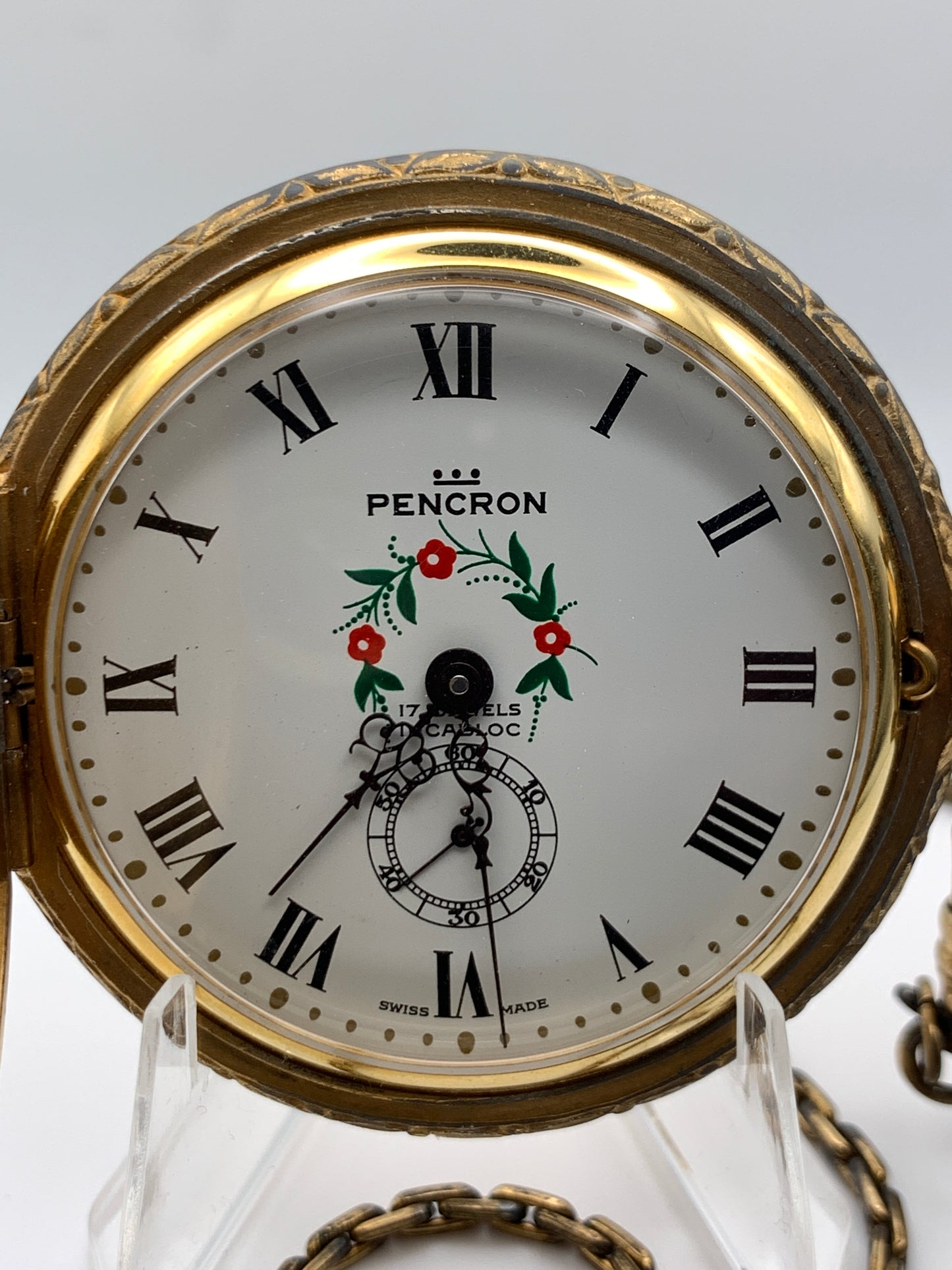 Pencron 44mm Swiss pocket watch. Unitas 6325 hand winding movement. Acrylic dome. Period correct chain and pocket knife.