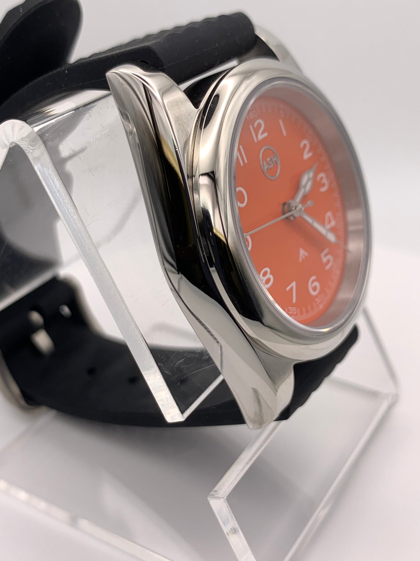 Blood Orange.  39mm stainless steel field watch. Sapphire crystal. NH38 automatic.