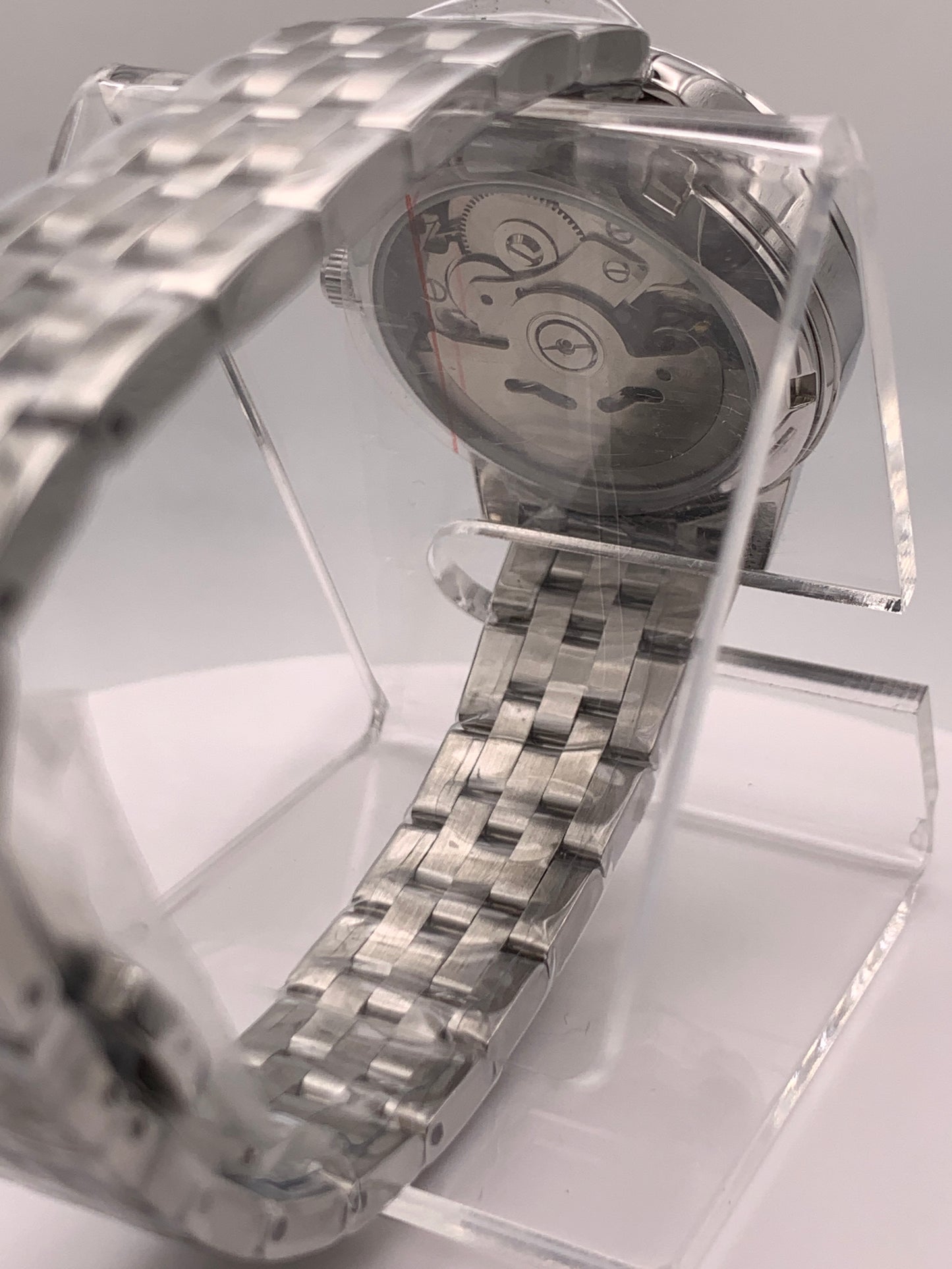 The Teal. Highly figured dress watch. 33mm stainless steel case. Faceted and domed acrylic crystal. NH35.