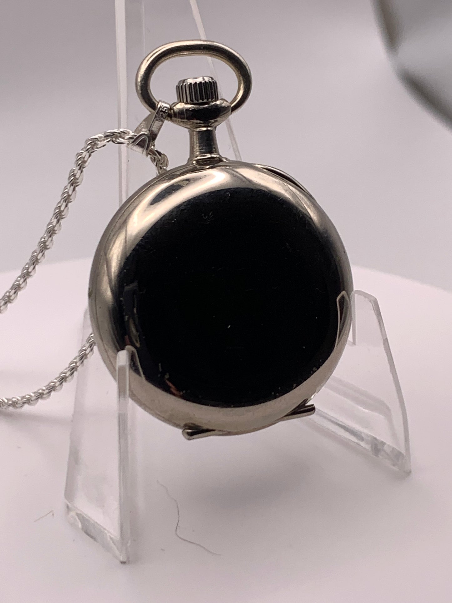 Amuse-bouche Deux. 30mm NOS Argentan alloy pocket / necklace watch. On a 24” 1.5mm sterling silver chain. Sapphire crystal. Vintage hand painted enamel dial. Miyota 2036.