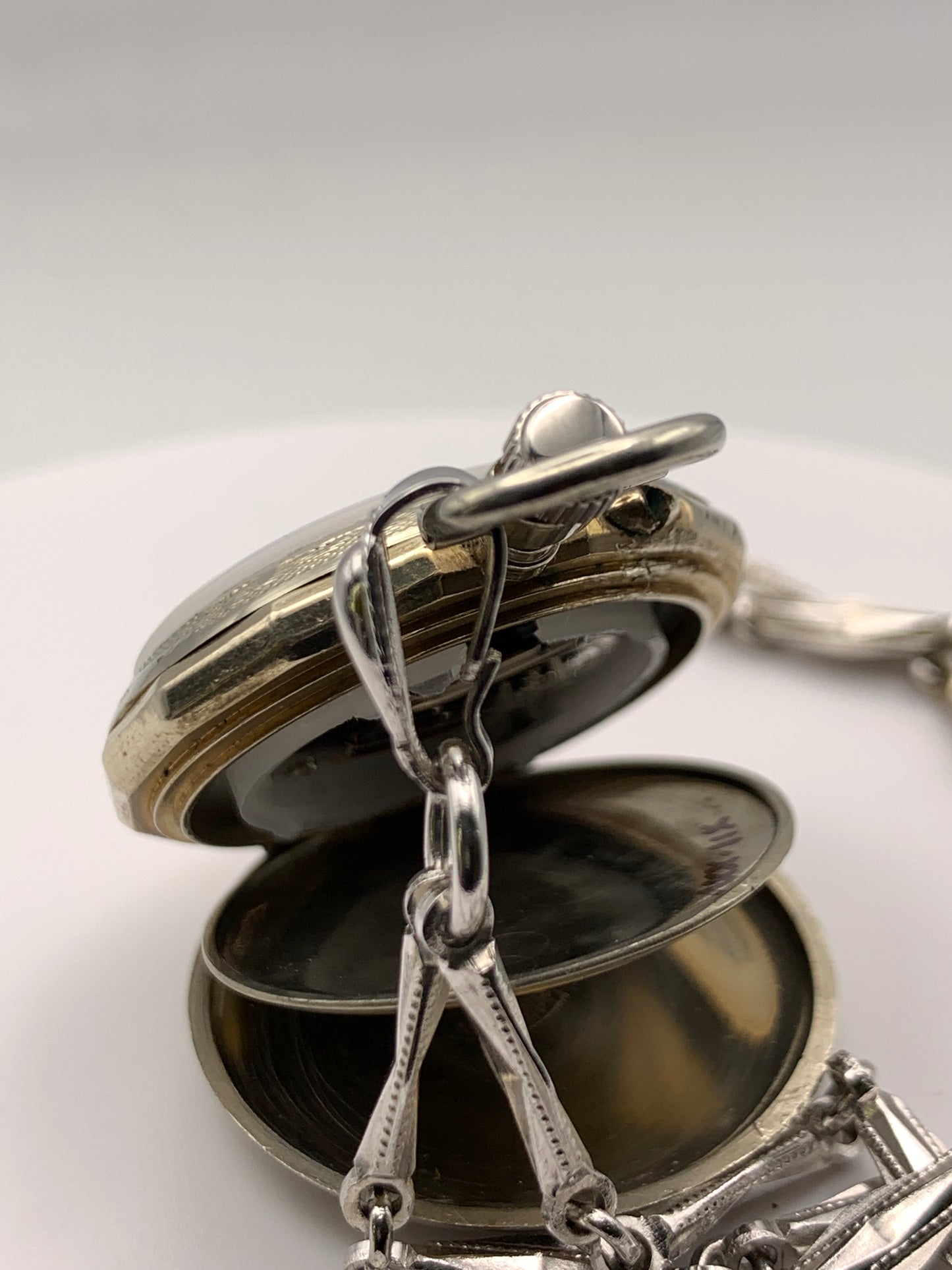 ‘Sold - Amuse-bouche. 30mm pocket / necklace watch. NOS Argentan alloy case and hand painted enamel dial. Sapphire crystal. Miyota 2036. 24” sterling necklace.