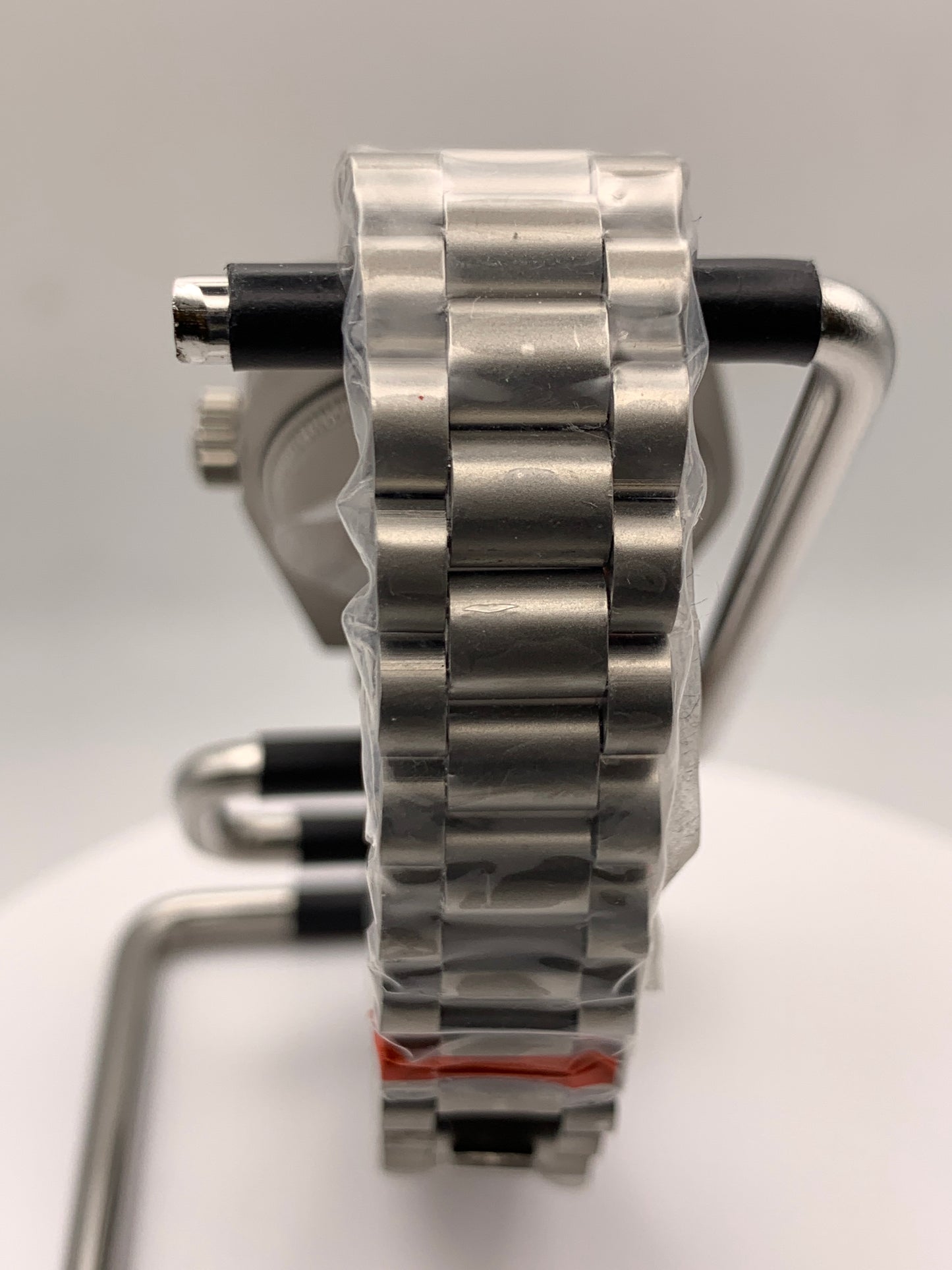 Microcosm. 31mm Brushed stainless steel with matching bracelet. Sapphire crystal. Seiko NH05 automatic.
