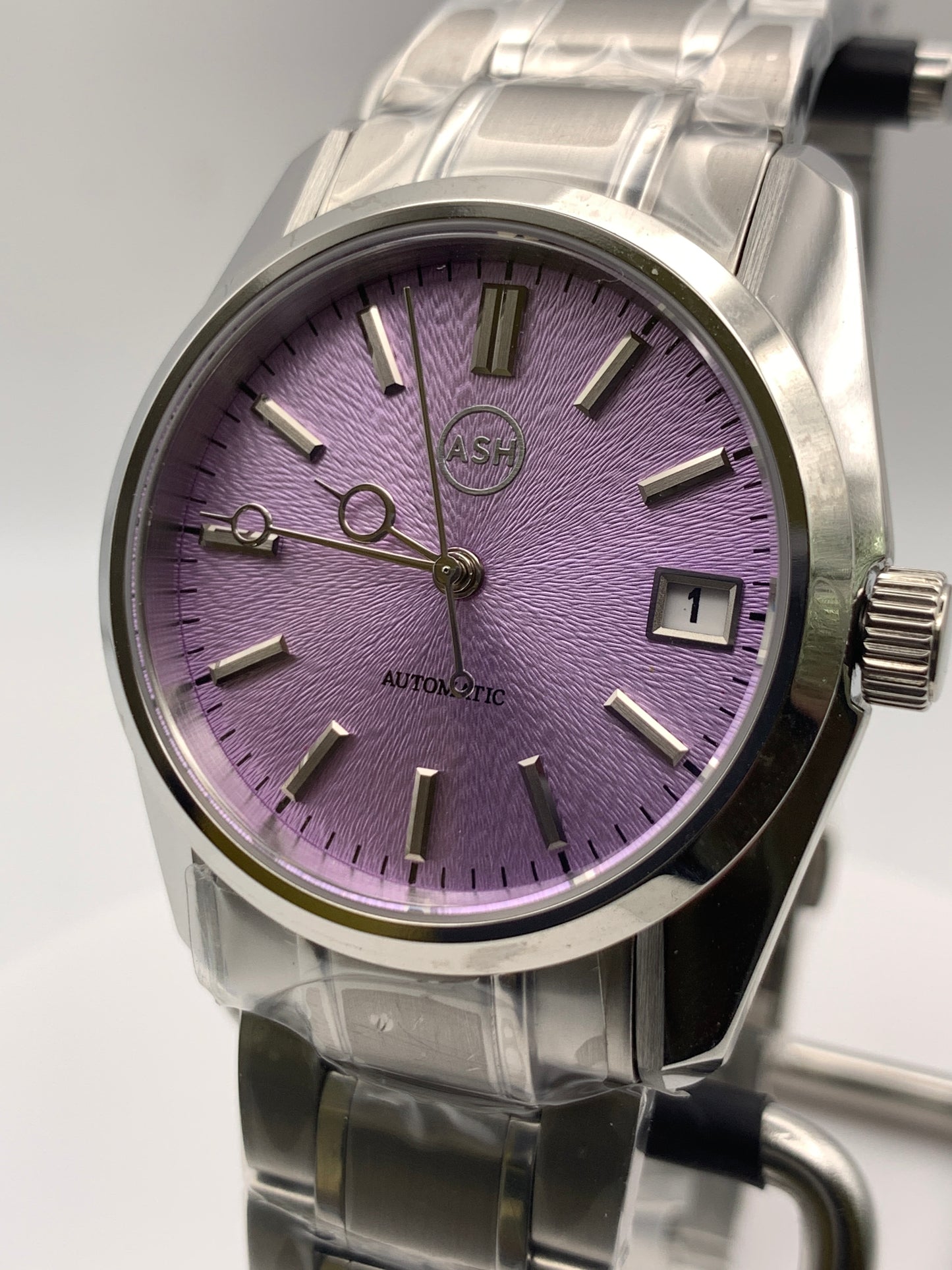 Violet II - 36mm Stainless steel case with matching bracelet. Unique dial. Sapphire crystal. Seiko NH35 automatic.
