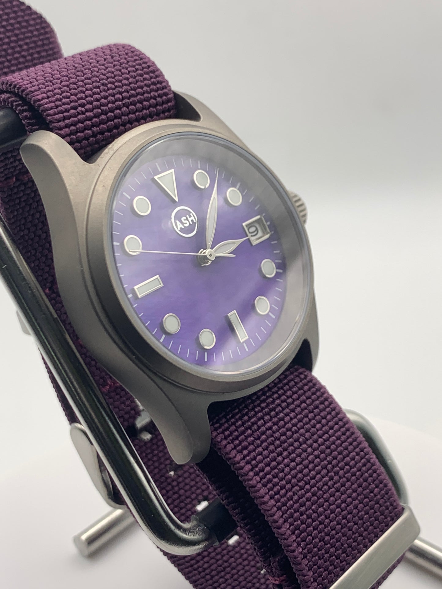 Larkspur. 36mm Titanium field watch. Purple MOP dial. Seiko NH35.
