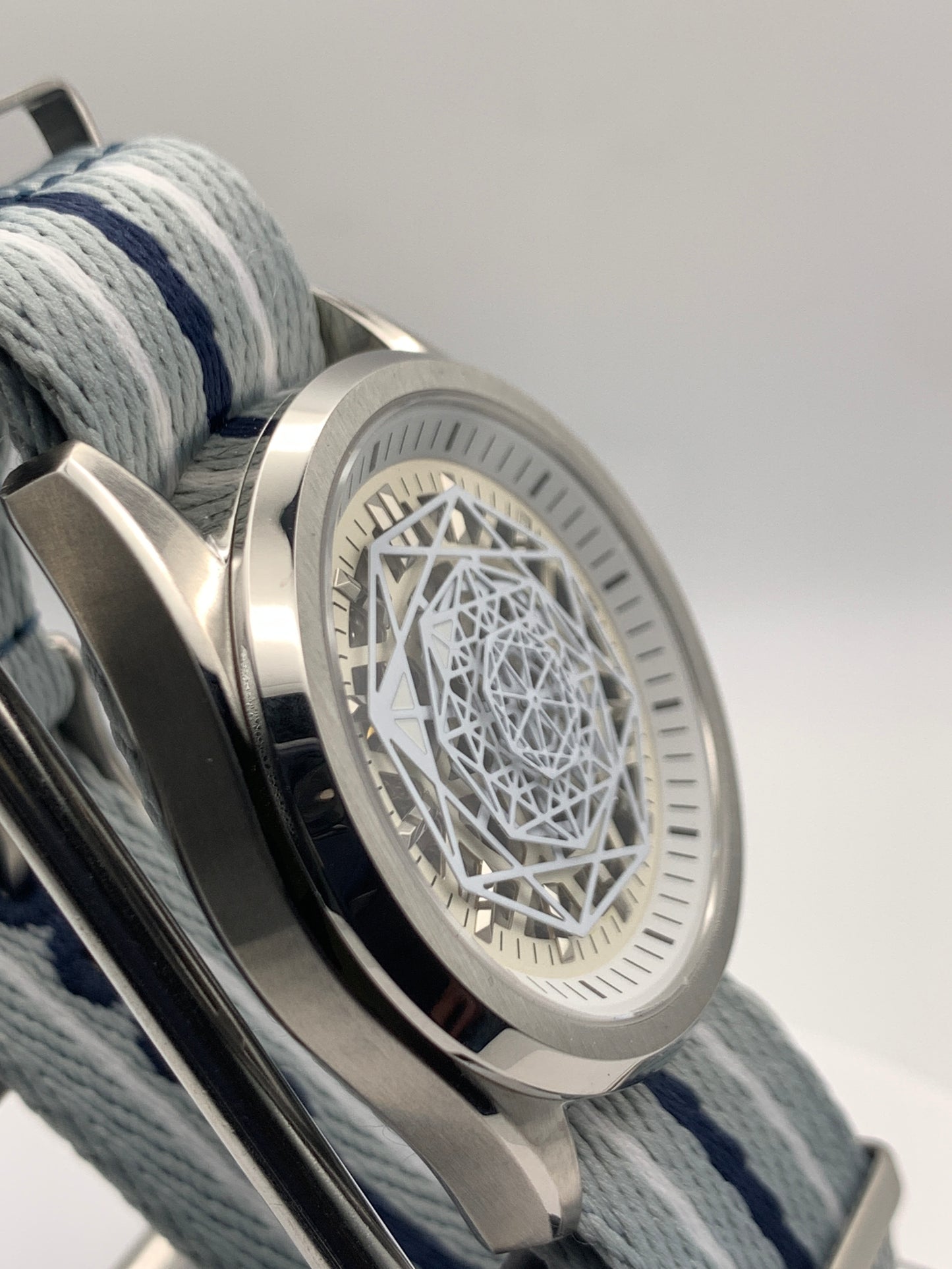 Blizzard - 40mm Stainless steel case. Sapphire crystal.  Snowflake dial and handset. Seiko NH70 skeleton automatic.