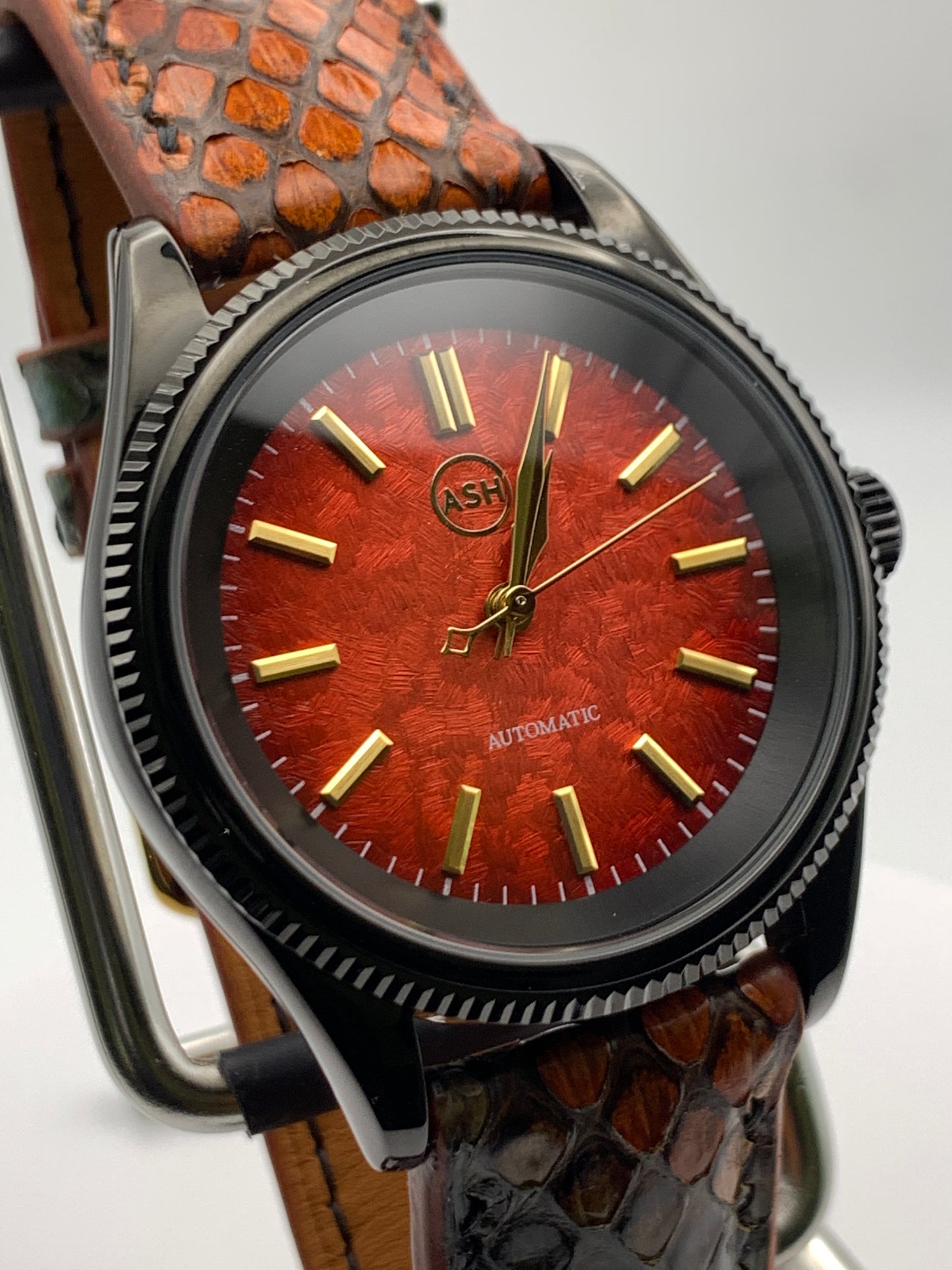 Ecthelion. Golden fire livery. 39mm fluted, PVD coated, stainless steel case. Sapphire crystal. Seiko NH38. Dragon scale strap. Mystical powers.