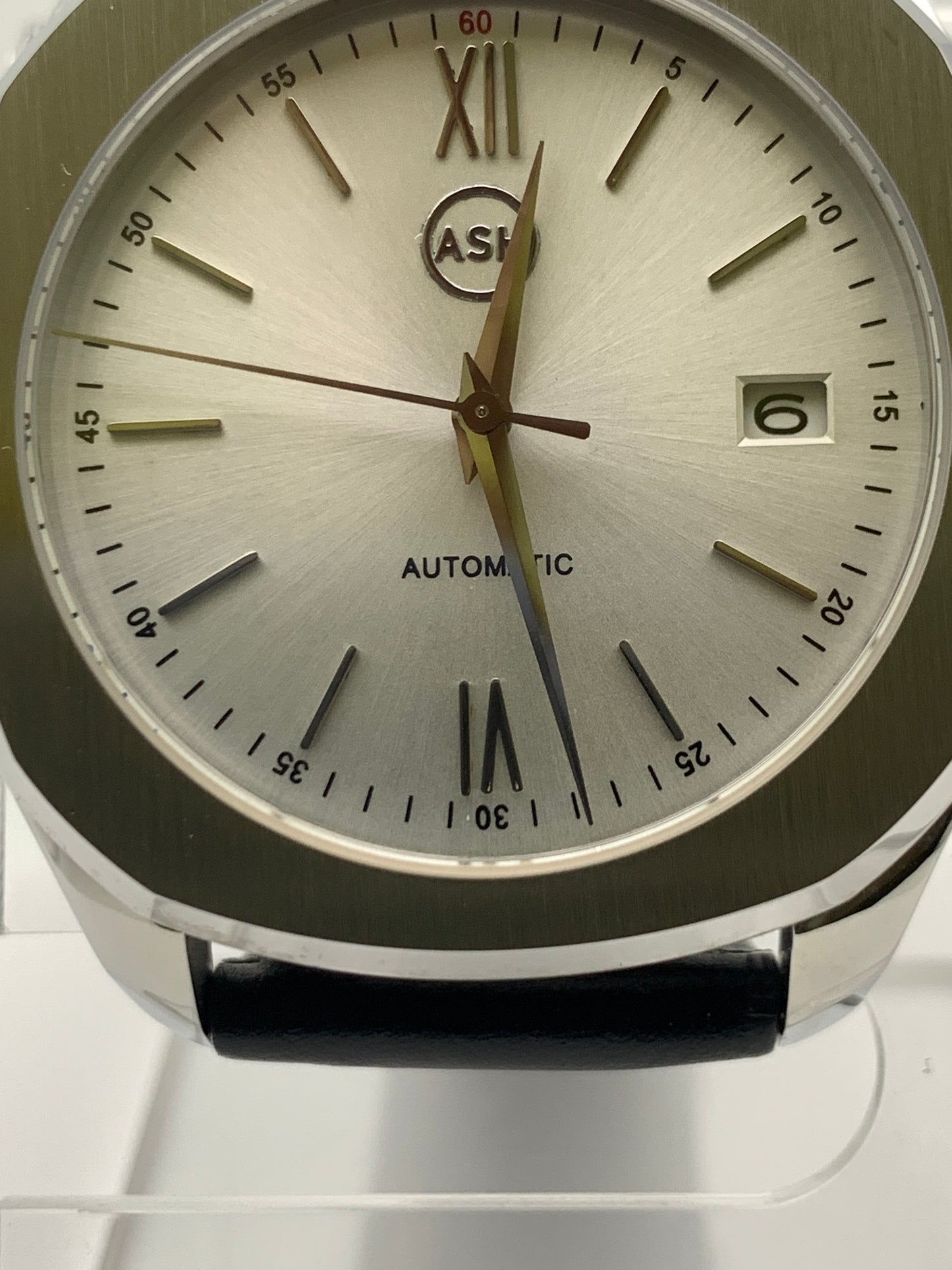 40mm Silver on silver dress watch.