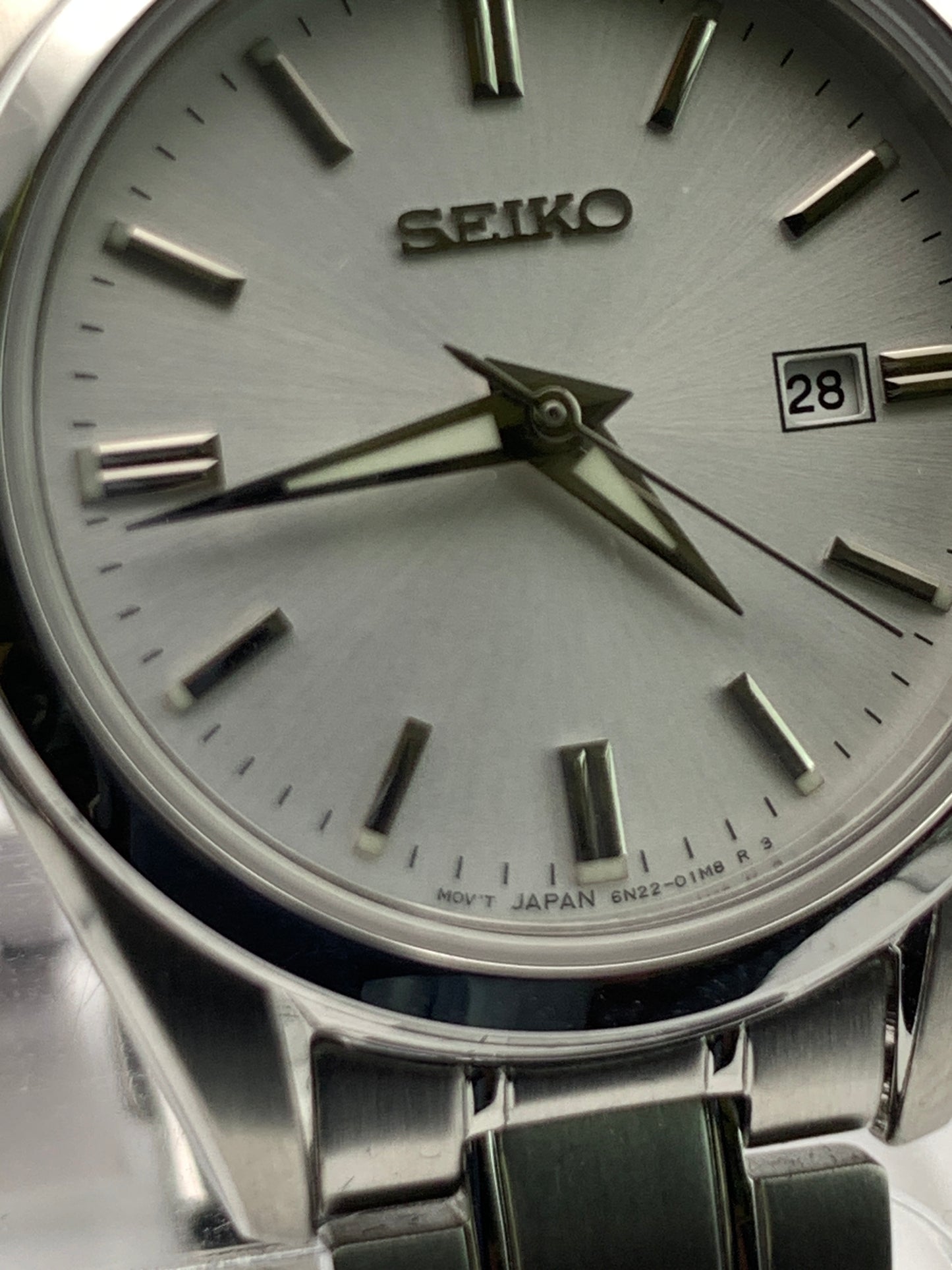 Seiko SUR633- 30mm Stainless steel case. Silver sunray dial. Sapphire crystal. 6n22 quartz movement. 100m water resistance. Box and papers.