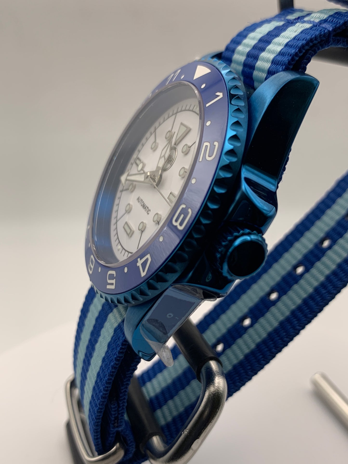 Europa - 41mm Blue anodized stainless steel case. Sapphire crystal. Seiko NH38.