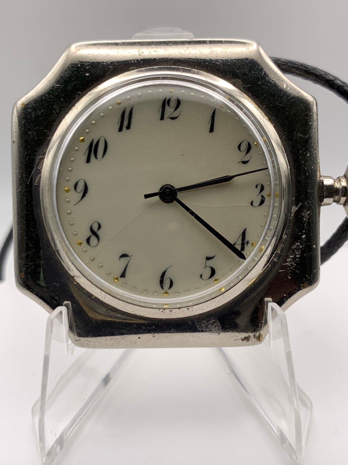 Palimpsest.  40 x 40mm plated brass case. Vintage pendant watch conversion. Domed acrylic crystal. Original enamel dial. Miyota 2036.