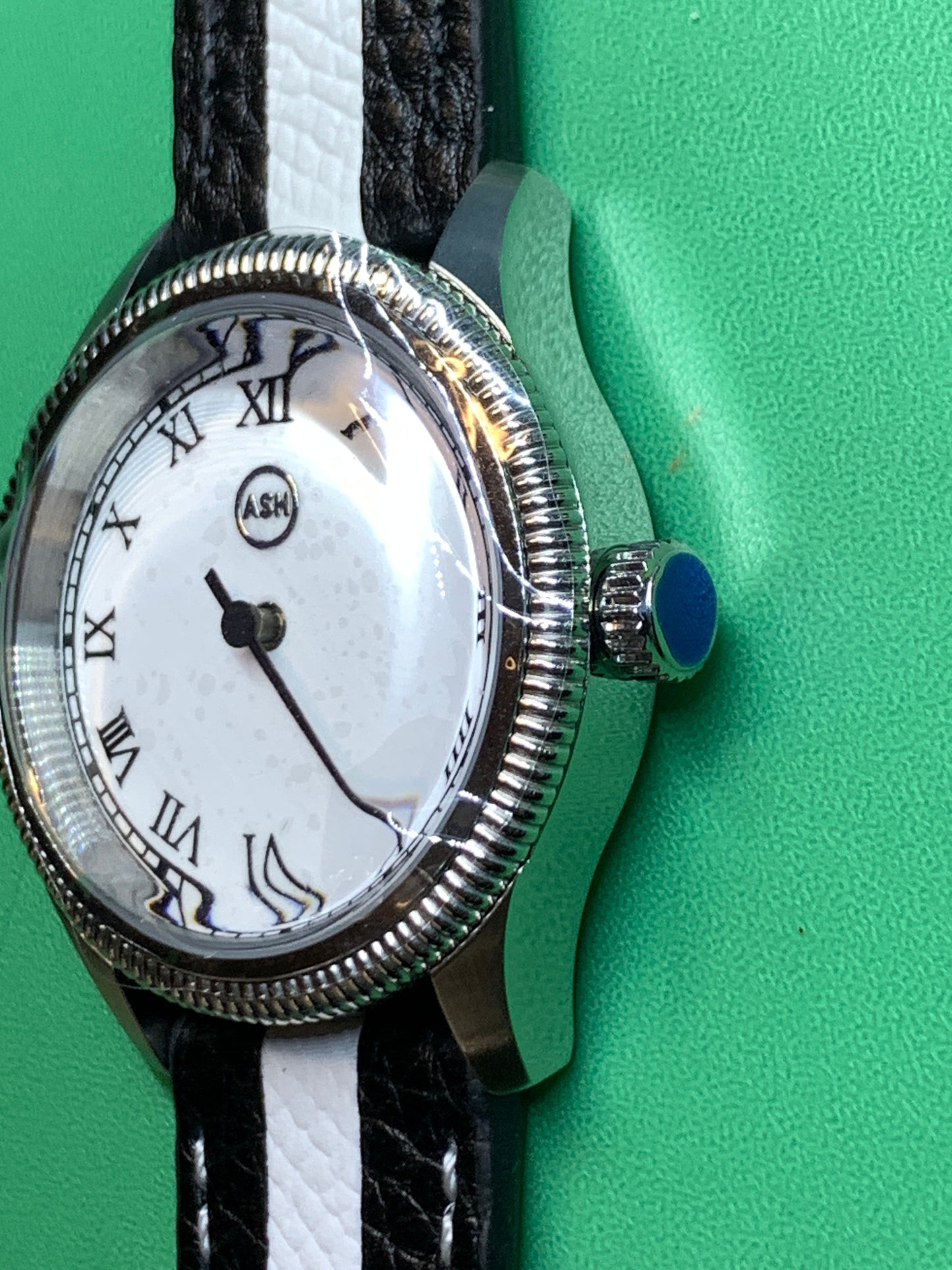 Thereabouts - One hand watch. 38mm coin edged stainless steel case. Enamel dial. Boxed K-1 crystal. Exhibition case back with blue custom rotor. Seiko NH38.