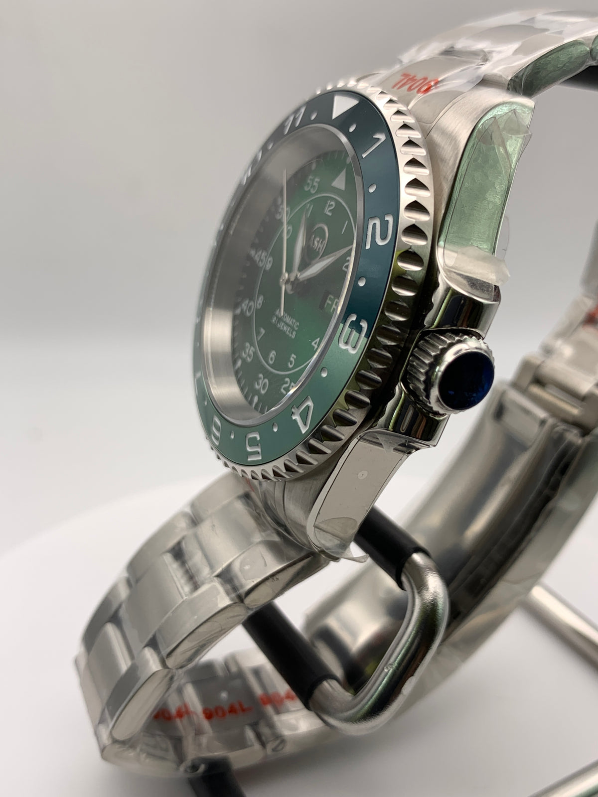 Dead Reckoning - 41mm Stainless Steel case with matching bracelet. Sapphire crystal. Seiko NH36 with green day/date wheels.