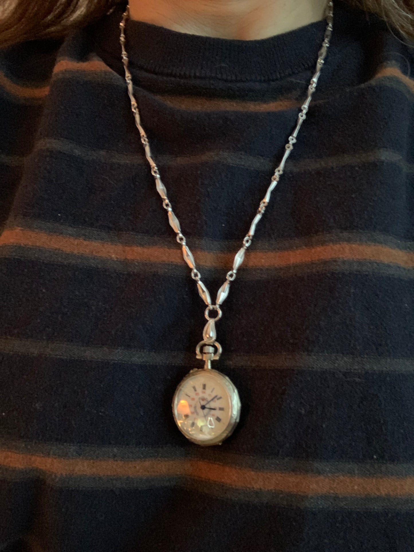 ‘Sold - Amuse-bouche. 30mm pocket / necklace watch. NOS Argentan alloy case and hand painted enamel dial. Sapphire crystal. Miyota 2036. 24” sterling necklace.