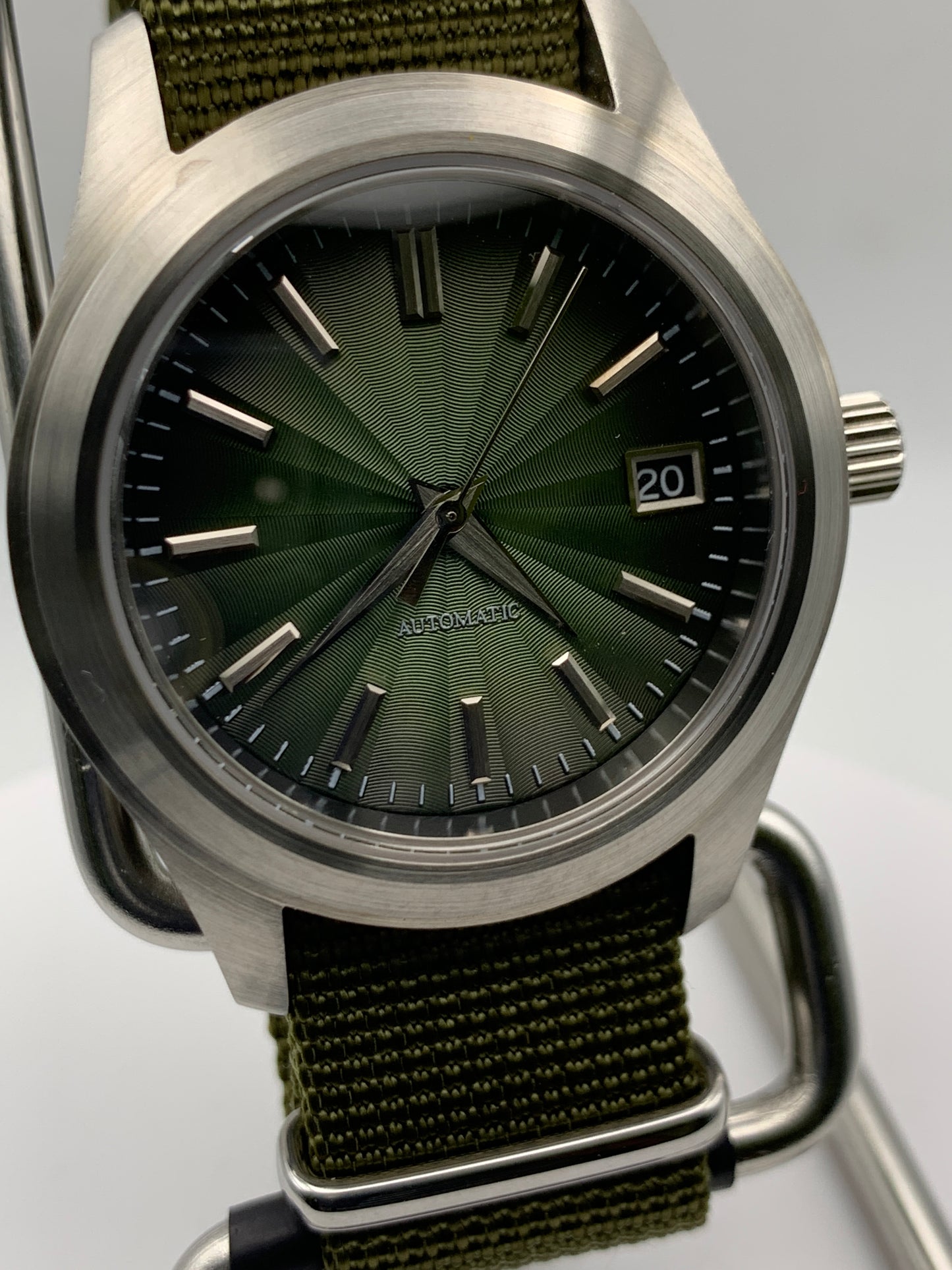 Fangorn 1.3 - 39mm brushed stainless steel. Sapphire crystal. Textured dial. Seiko NH35 with black date dial.