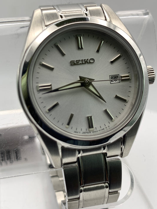 Seiko SUR633- 30mm Stainless steel case. Silver sunray dial. Sapphire crystal. 6n22 quartz movement. 100m water resistance. Box and papers.