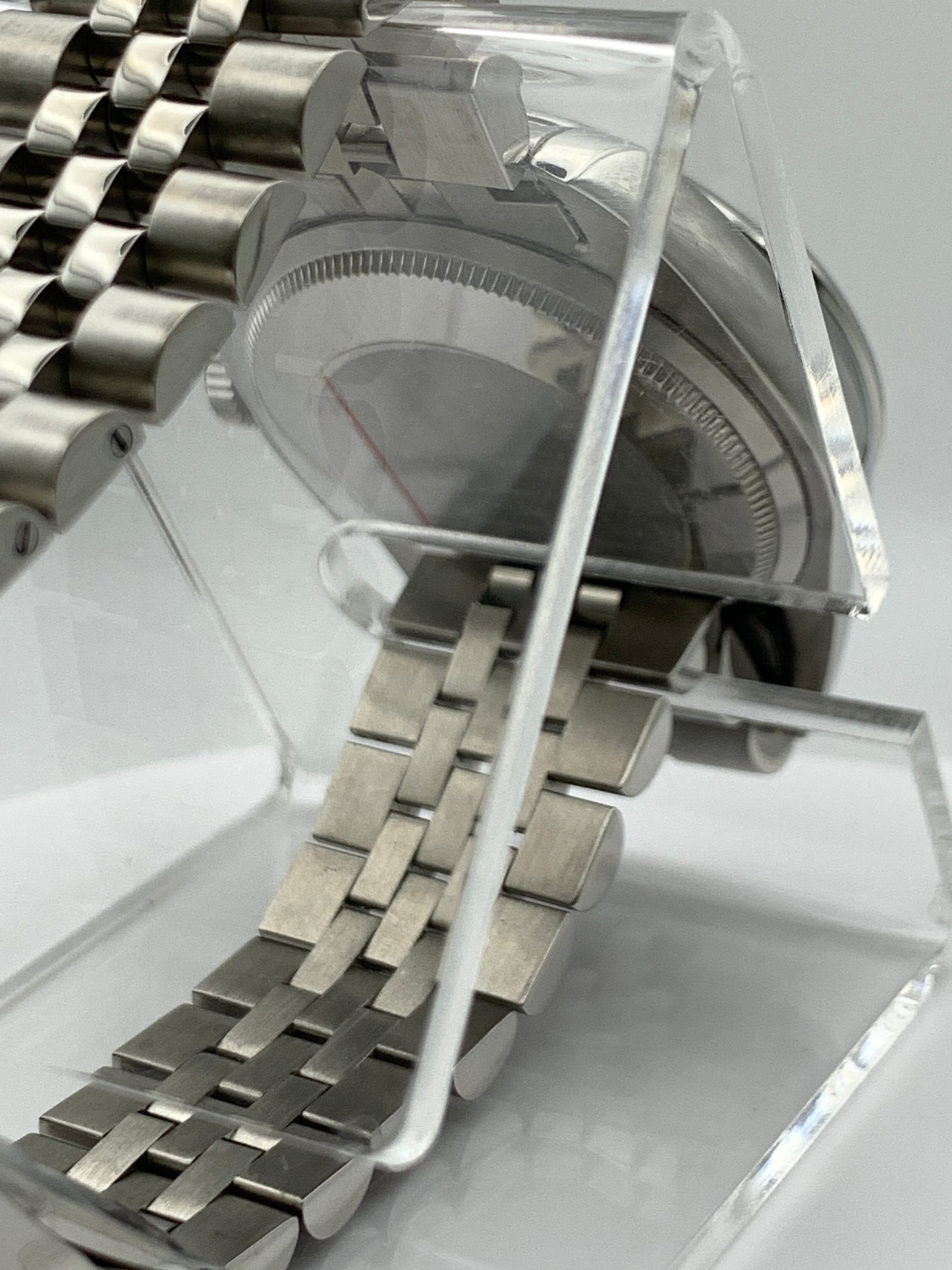Pale yellow 36mm sport watch on bracelet.