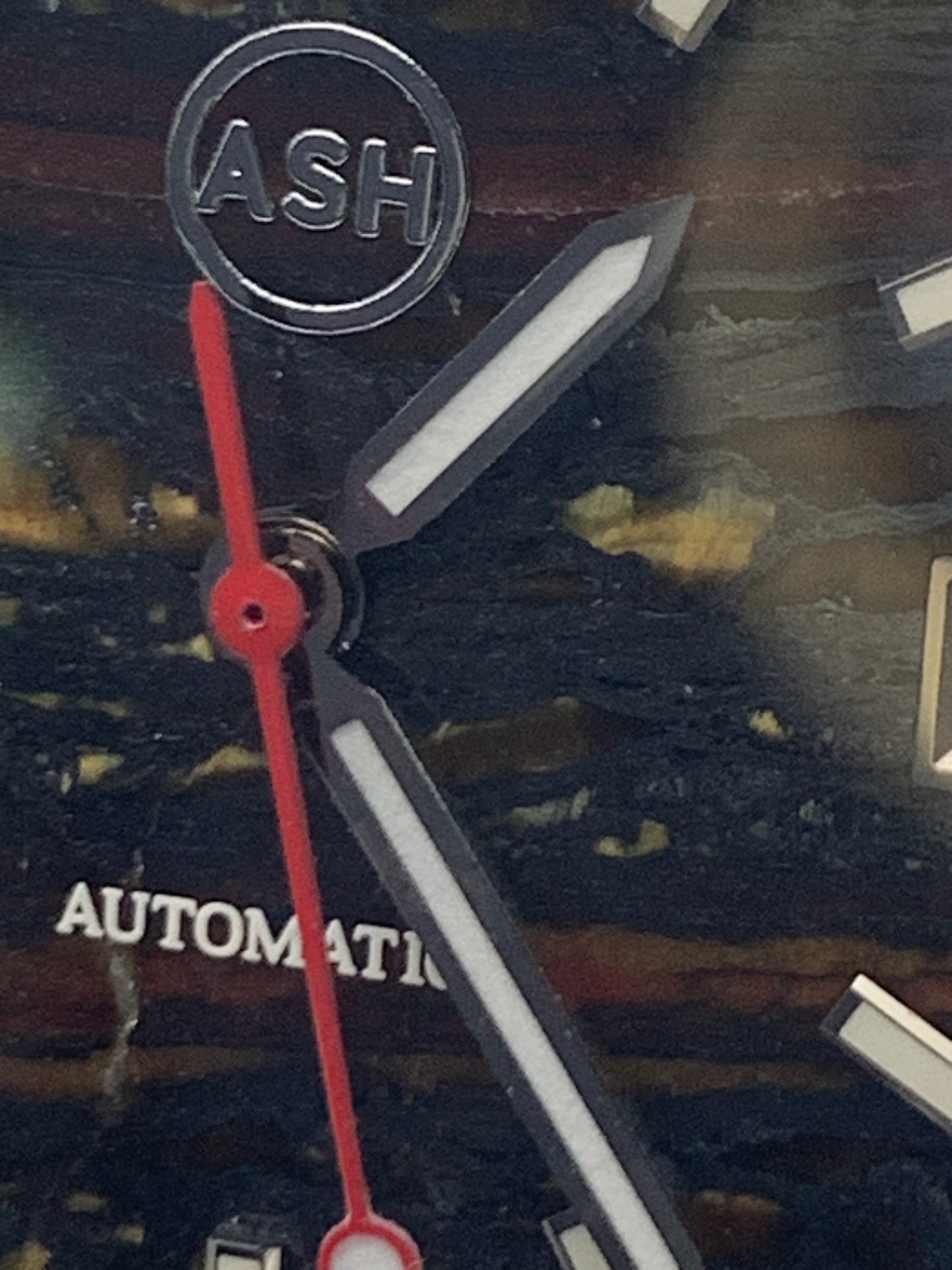 Agharta. 39mm Stainless steel. Iron Tiger Eye dial. Sapphire crystal. Seiko NH35.