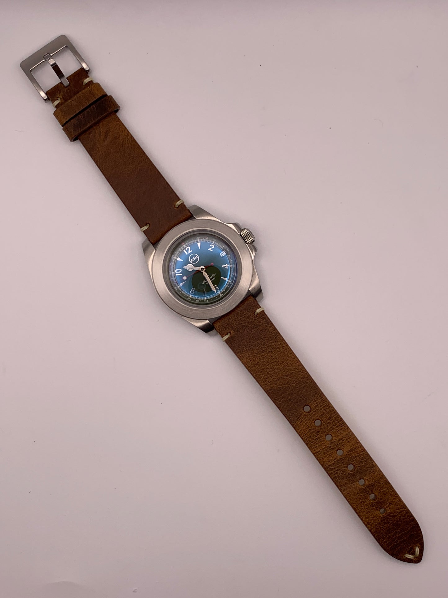 Skillset. Client custom. 40mm Brushed stainless steel case. Double dome mineral glass with AR. Seiko NH35.
