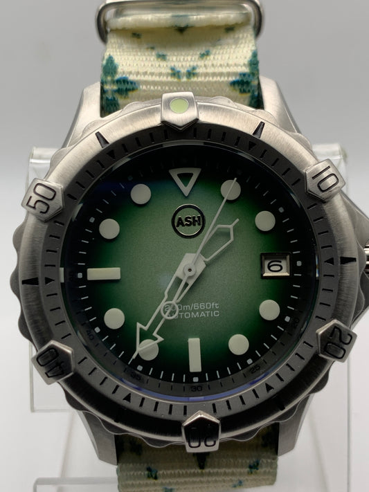 Thymekeeper.  42mm Stainless steel case.  Sapphire crystal. Seiko NH35.