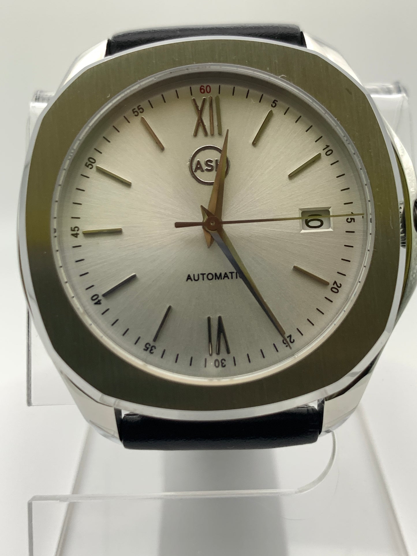 40mm Silver on silver dress watch.