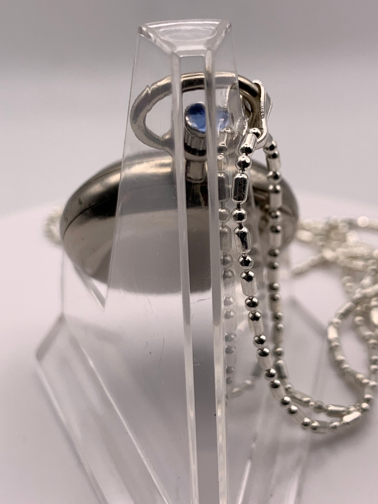 Amuse-bouche III.  Pendant / necklace watch. 30mm Argentan case. Sapphire crystal. Miyota 2036. 24” chain.