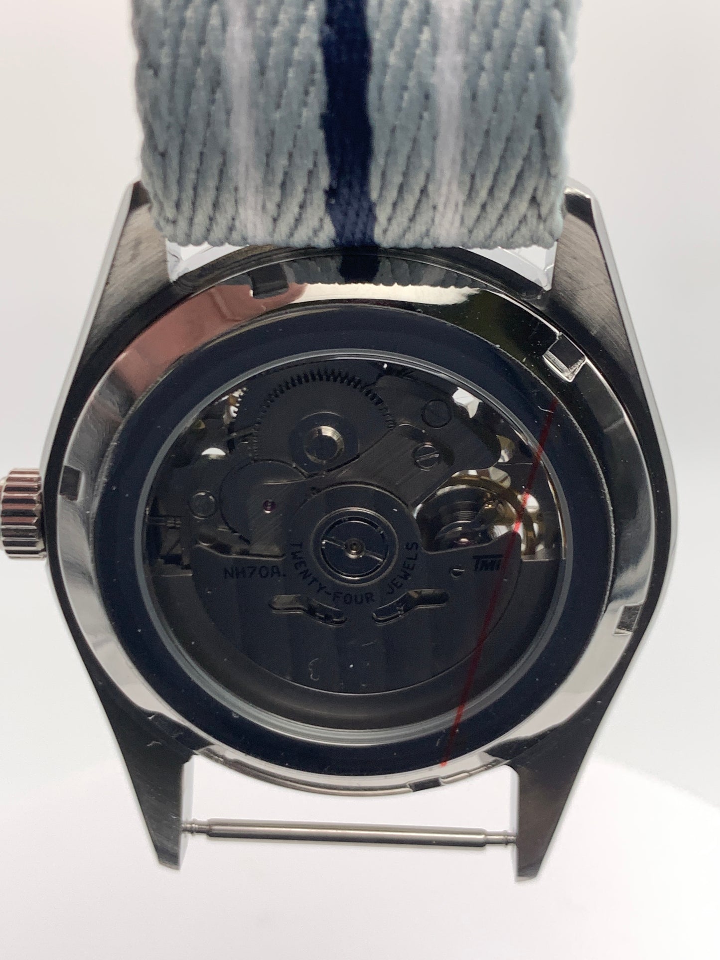 Blizzard - 40mm Stainless steel case. Sapphire crystal.  Snowflake dial and handset. Seiko NH70 skeleton automatic.