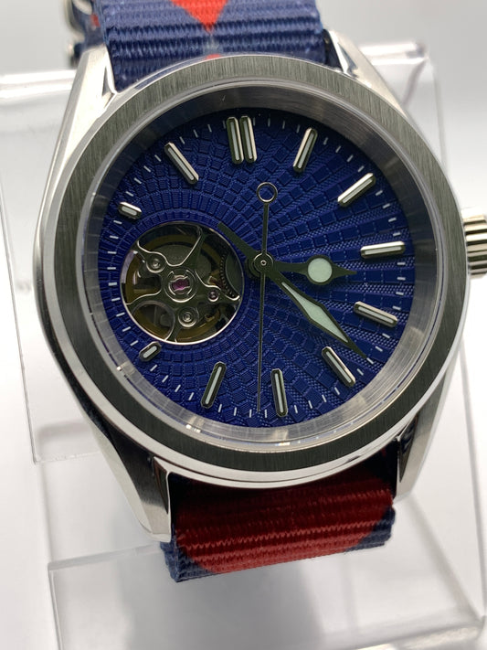 Blue Shift.  38mm Stainless steel. Sapphire crystal.  Seiko NH38.