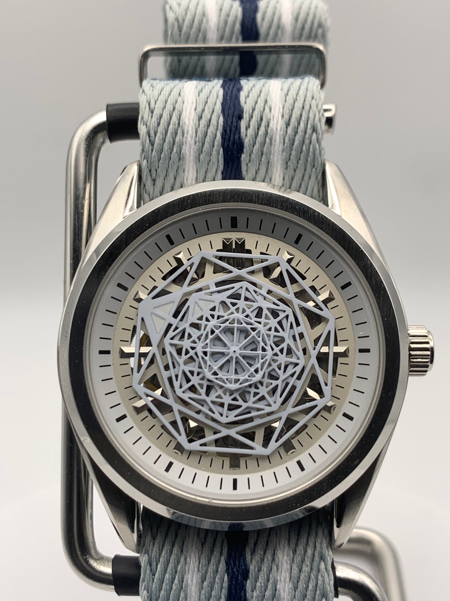 Blizzard - 40mm Stainless steel case. Sapphire crystal.  Snowflake dial and handset. Seiko NH70 skeleton automatic.