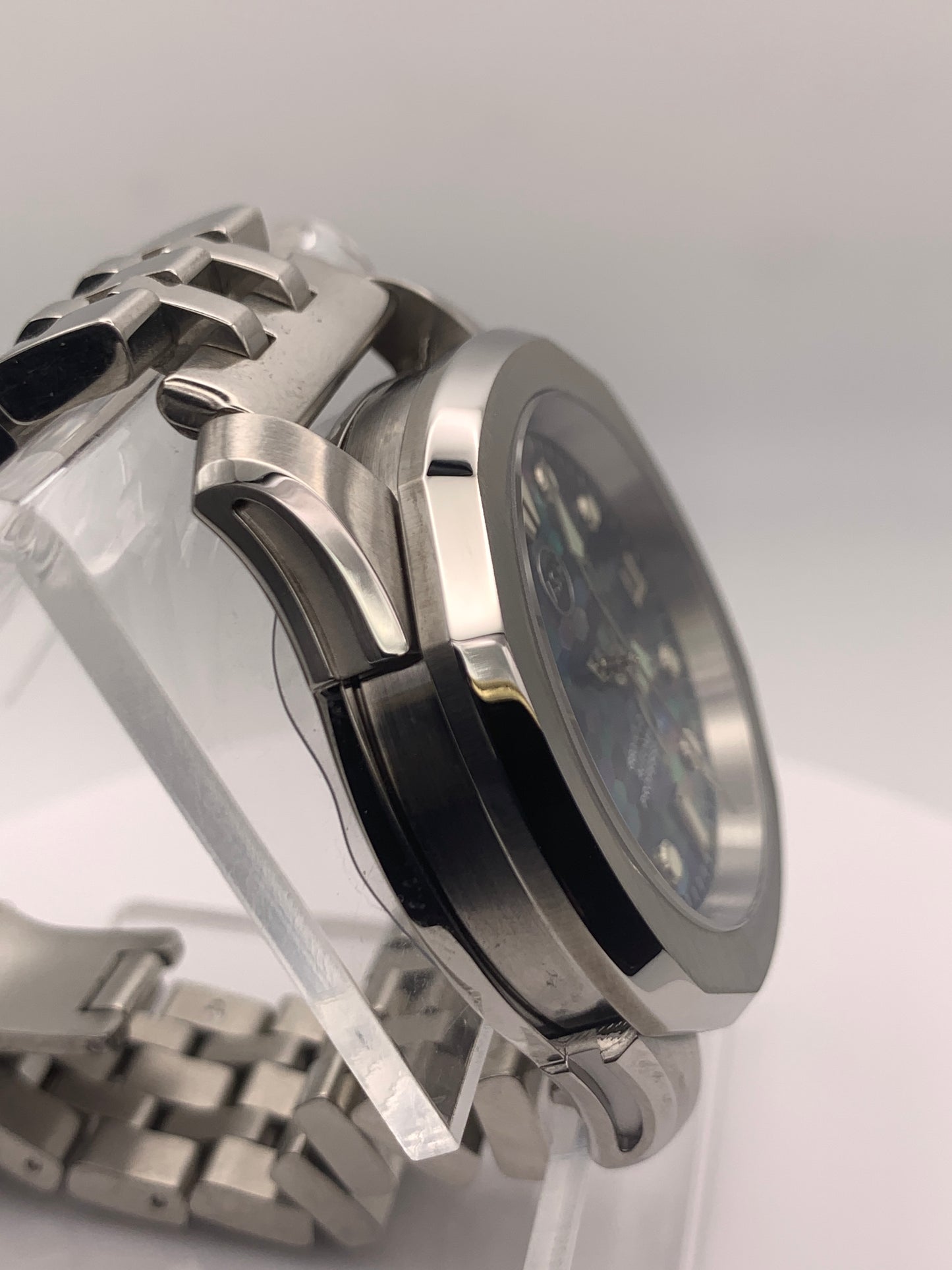 Spectrum. Mosaic mother of pearl dial. 38mm Stainless steel case. Sapphire crystal. NH35 automatic movement.