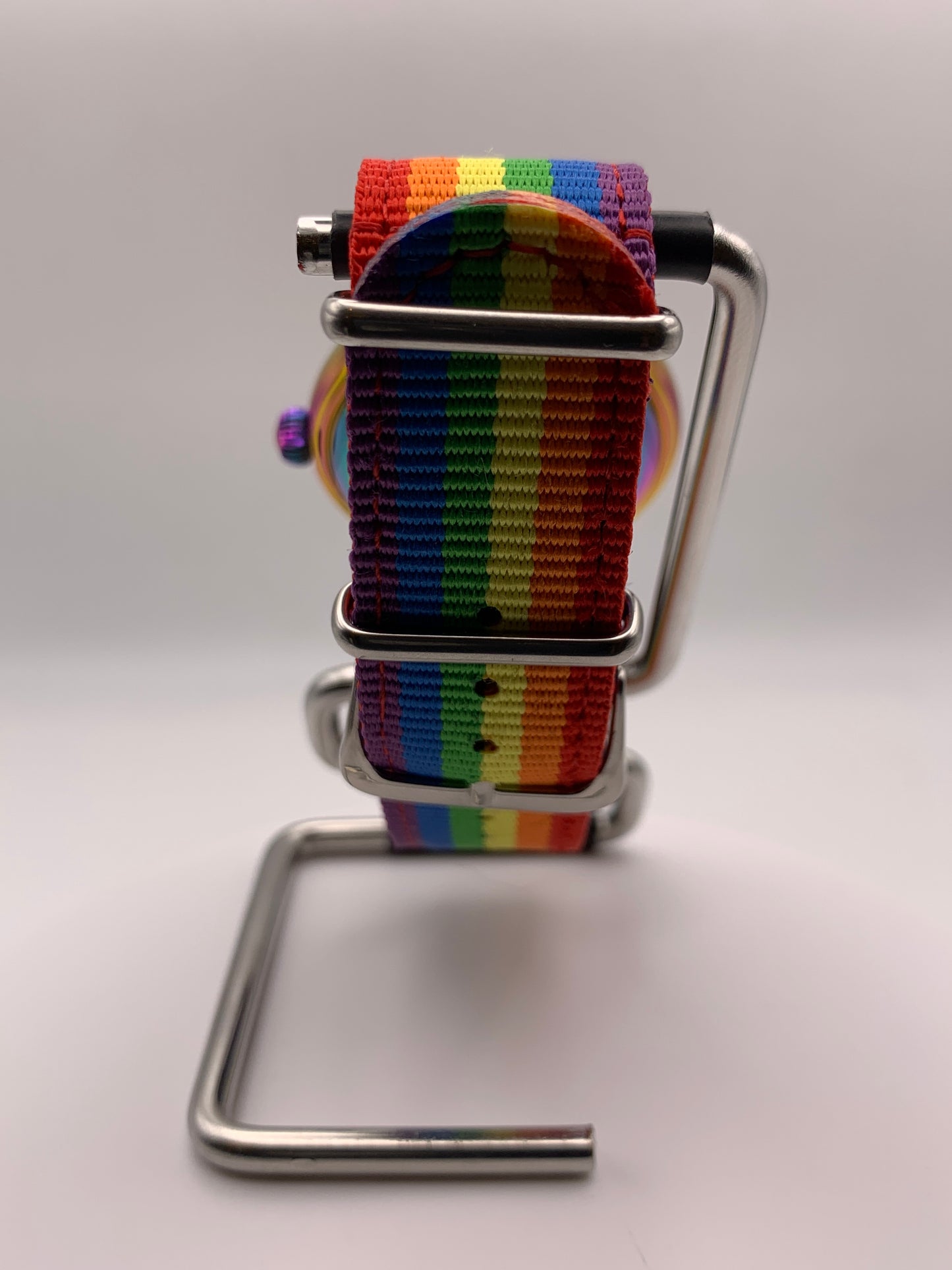 Portable rainbow. 38mm thermally colored stainless steel case and case back. Double dome K-1 mineral crystal. Seiko NH35.
