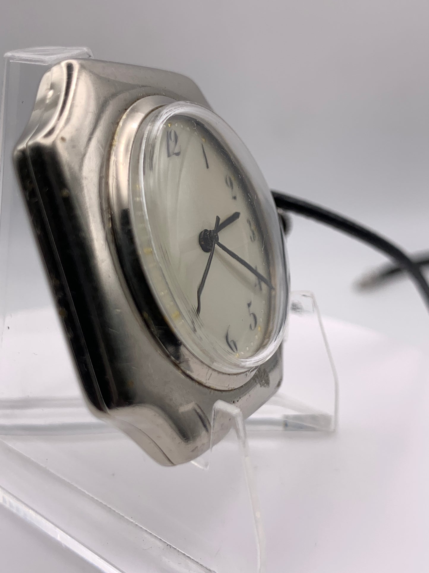 Palimpsest.  40 x 40mm plated brass case. Vintage pendant watch conversion. Domed acrylic crystal. Original enamel dial. Miyota 2036.