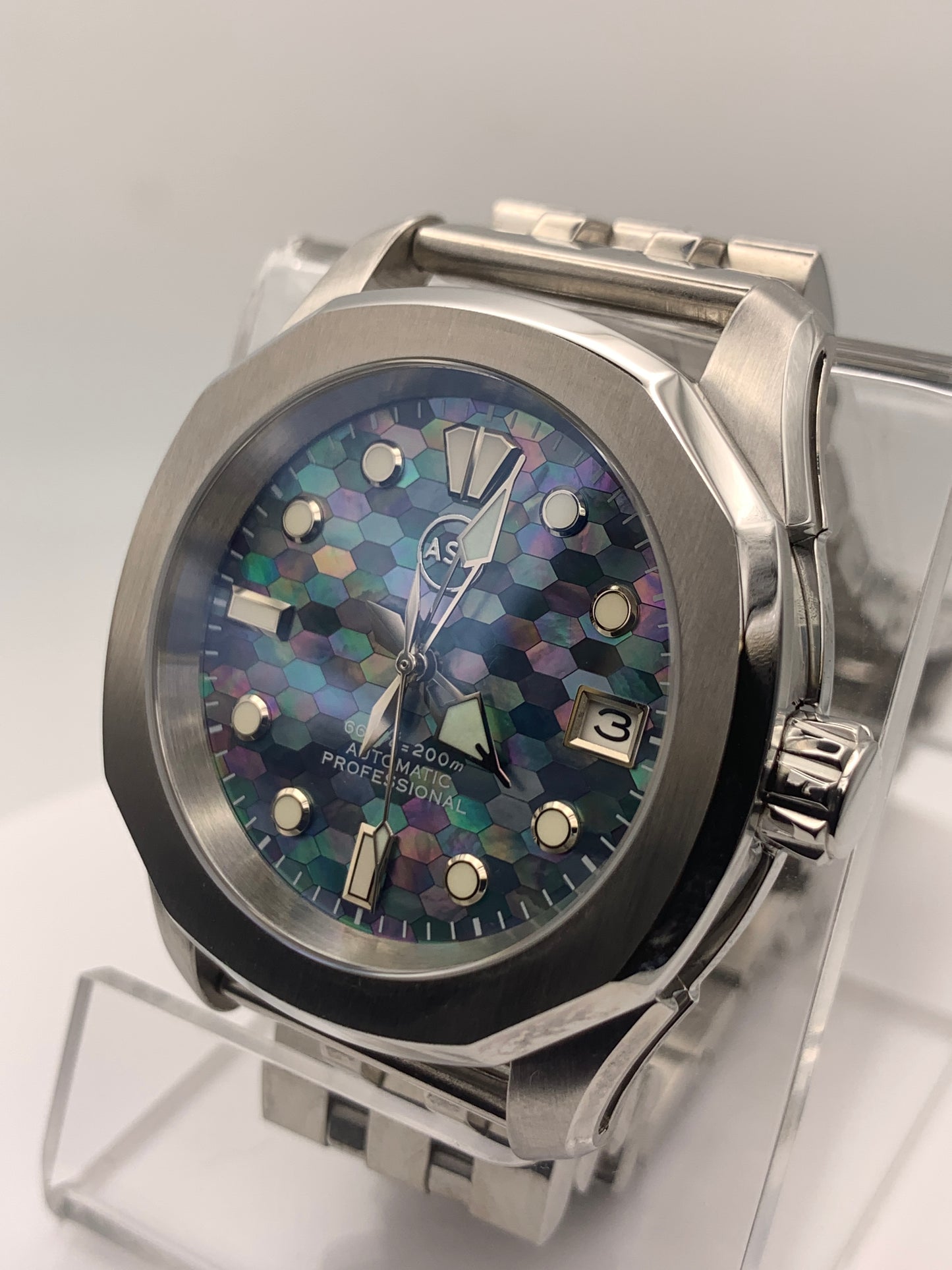 Spectrum. Mosaic mother of pearl dial. 38mm Stainless steel case. Sapphire crystal. NH35 automatic movement.
