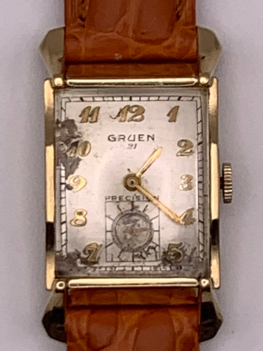 Gruen Precision 335, circa 1950, wrist watch repair. New balance staff and mainspring. 20mm wide. 34mm lug to lug.