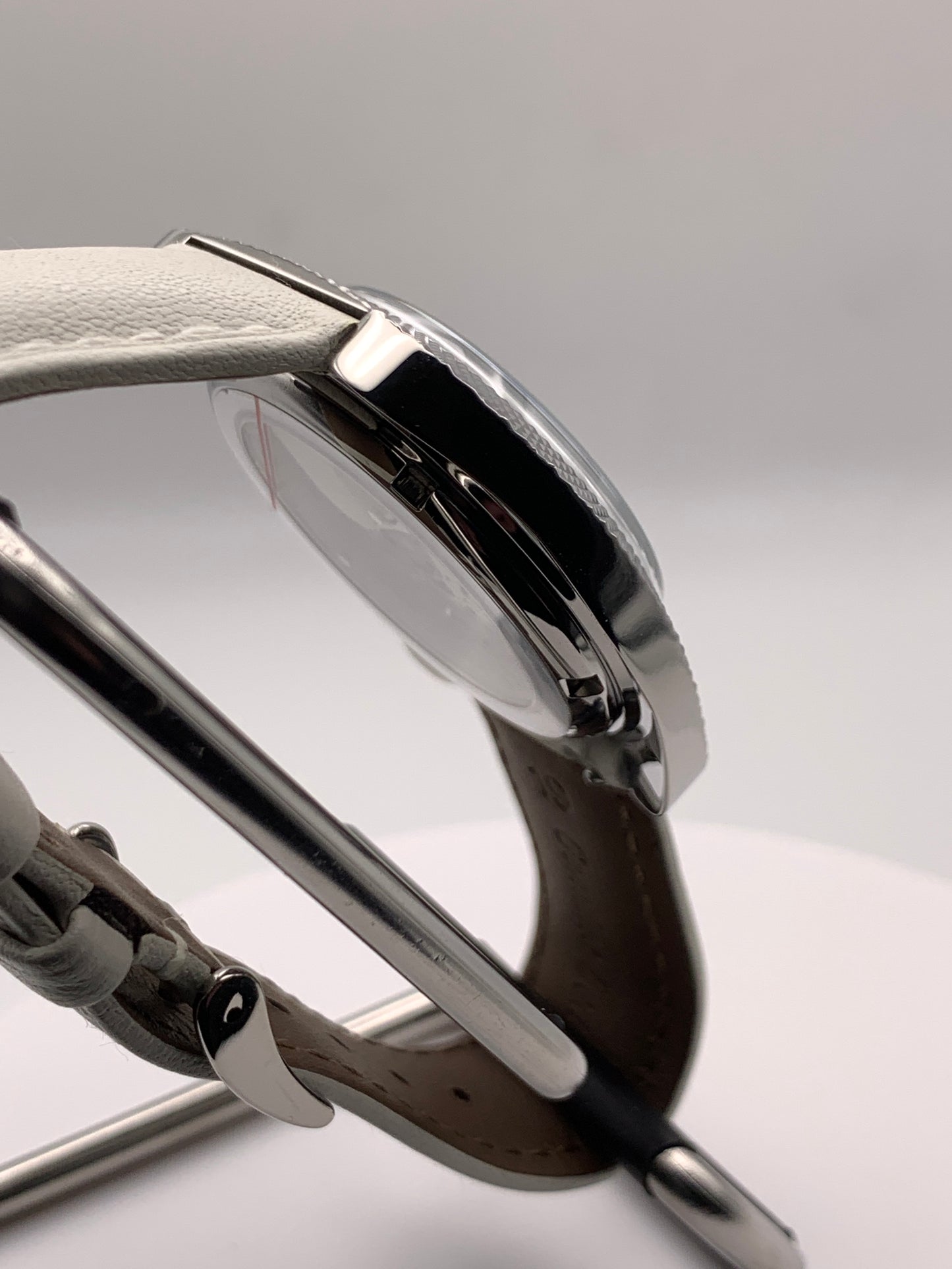 Lily. Faceted 37mm stainless steel case. Acrylic domed crystal. Charlotte stone dial.  Seiko VH31 mecha-quartz.