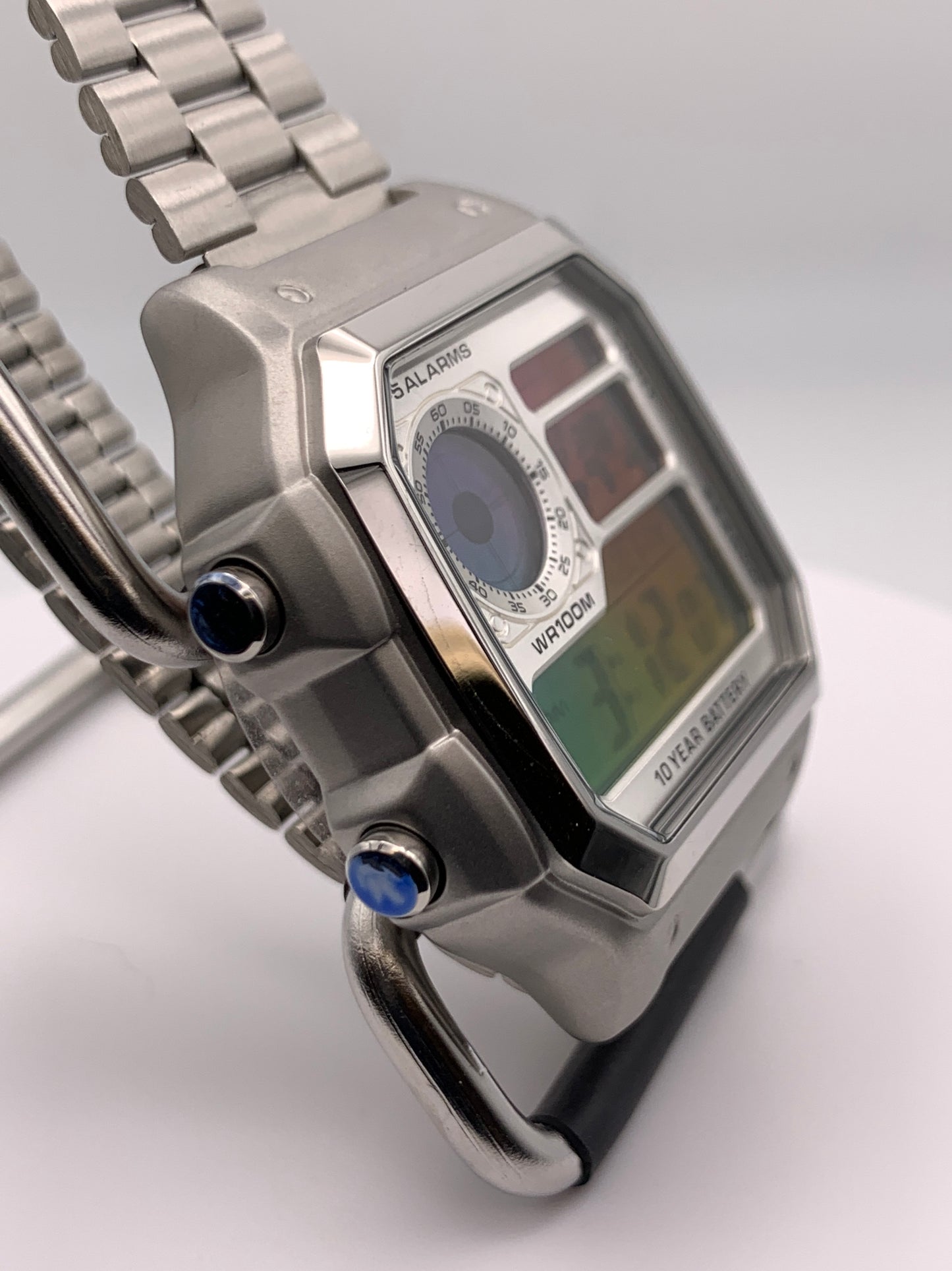 ‘Sold. Royale with Cheese. Casio AE1200. Rainbow filter. Metal case. Silver sunray faceplate. Vintage style bracelet. Flashing alarm upgrade.