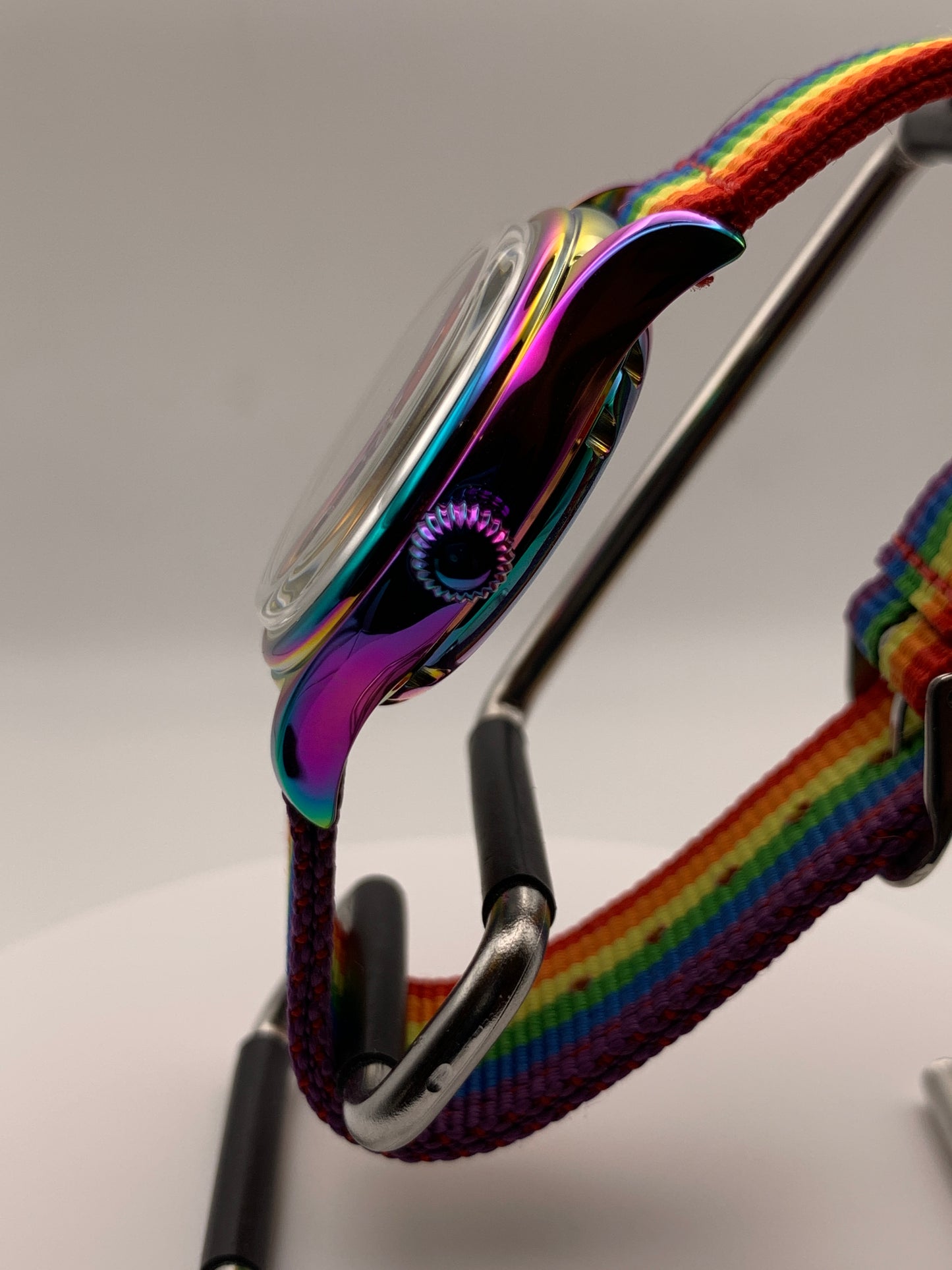 Portable rainbow. 38mm thermally colored stainless steel case and case back. Double dome K-1 mineral crystal. Seiko NH35.