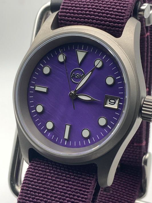 Larkspur. 36mm Titanium field watch. Purple MOP dial. Seiko NH35.