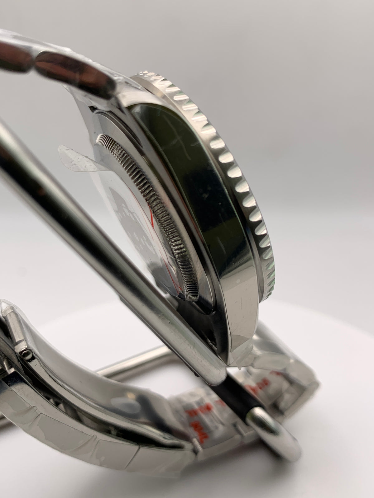 Dead Reckoning - 41mm Stainless Steel case with matching bracelet. Sapphire crystal. Seiko NH36 with green day/date wheels.