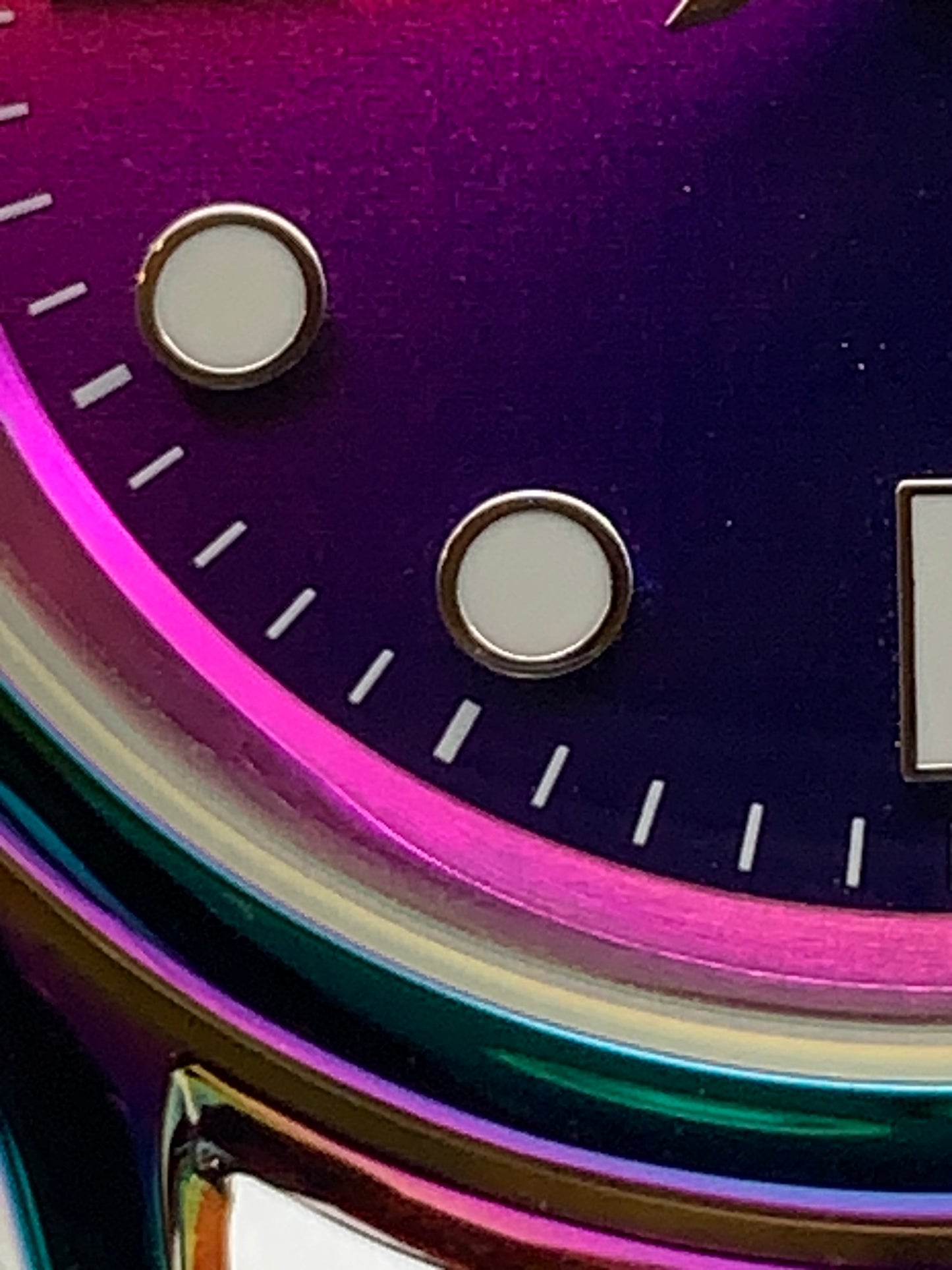 Portable rainbow. 38mm thermally colored stainless steel case and case back. Double dome K-1 mineral crystal. Seiko NH35.