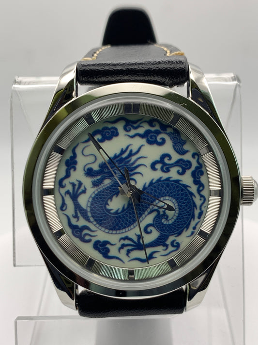 Qinglong - 39mm stainless steel case with engine turned chapter ring. Sapphire crystal. Seiko NH38.