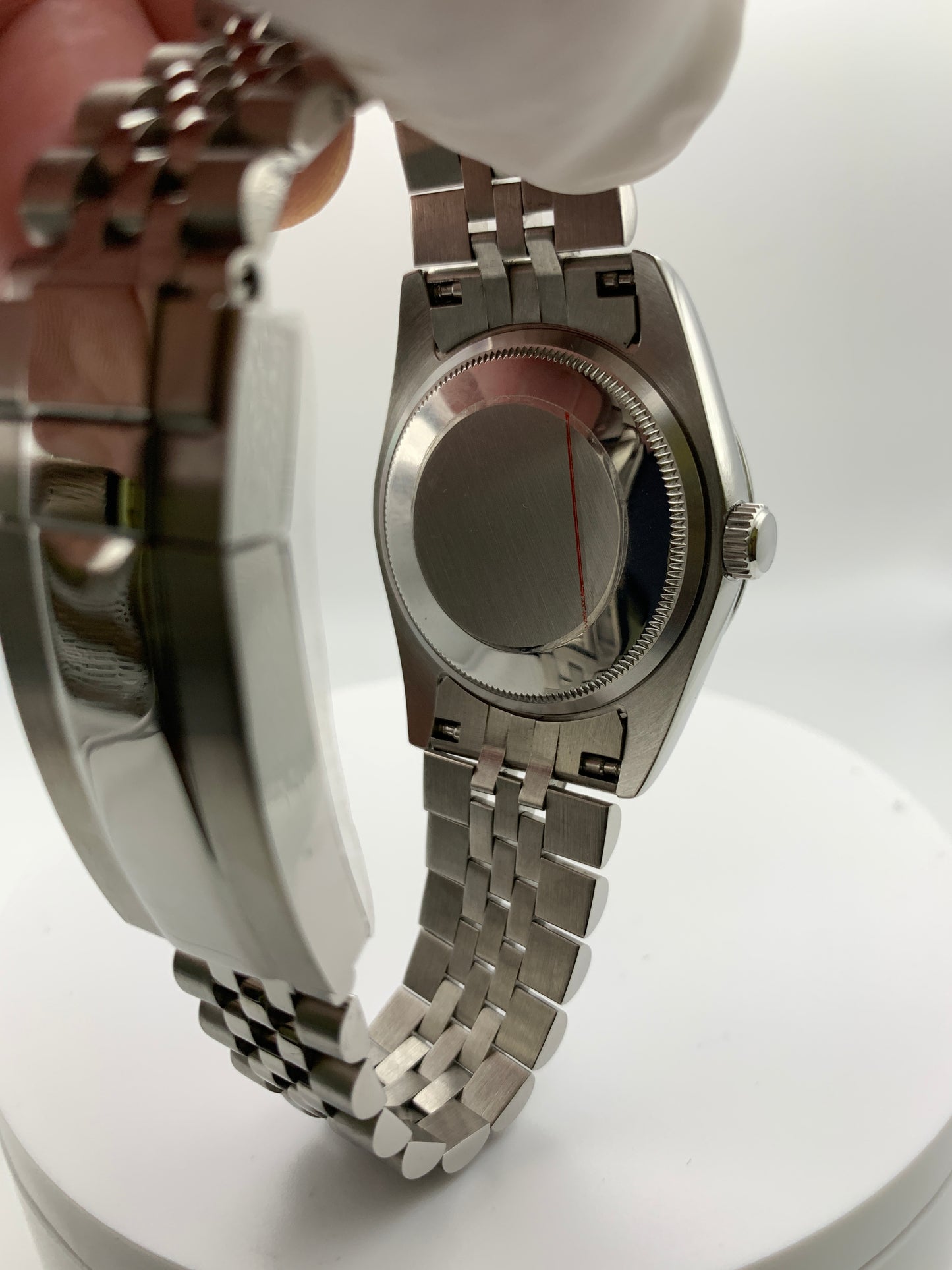 Pale yellow 36mm sport watch on bracelet.